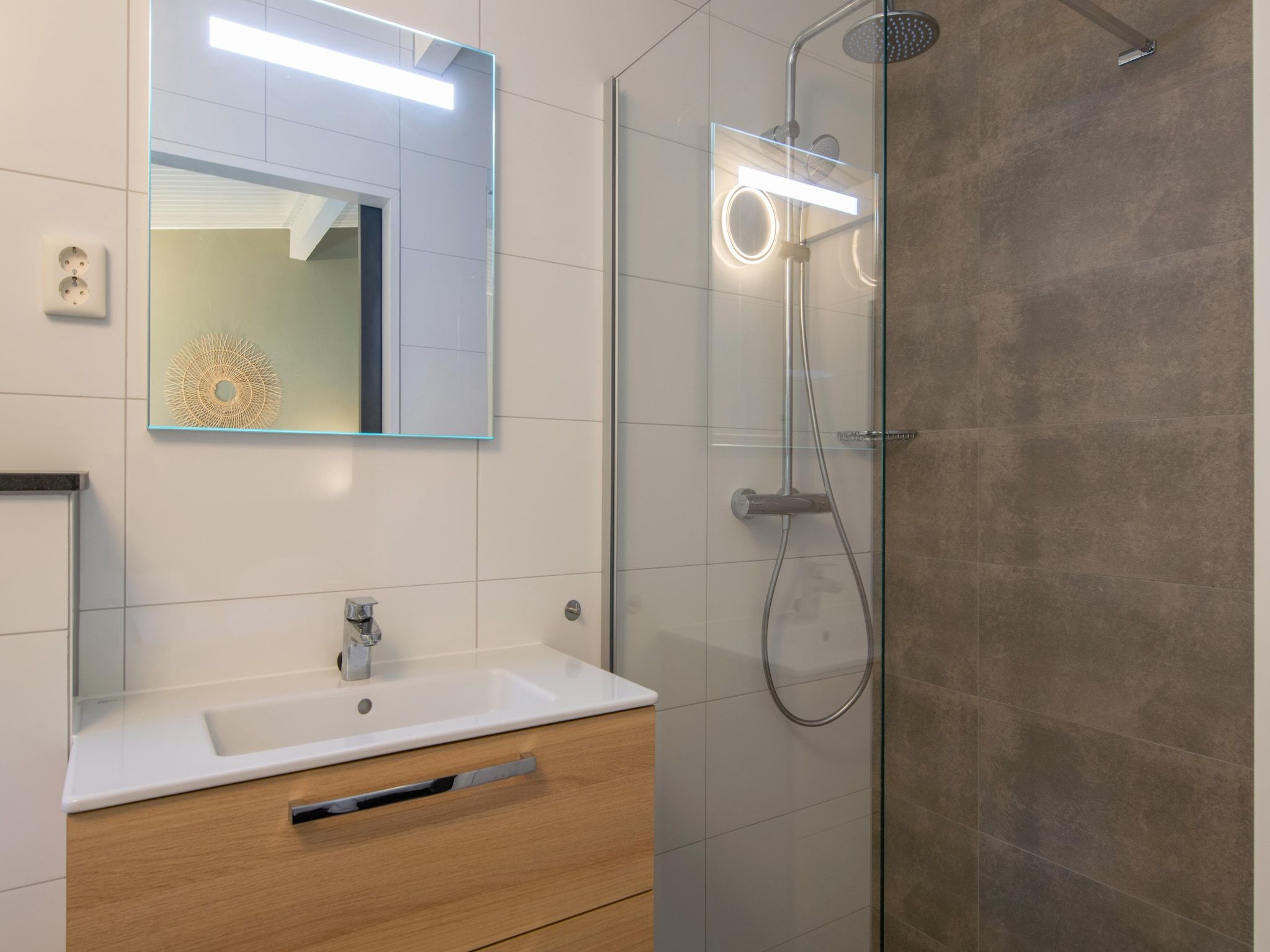 De badkamer van Bospark 't Wolfsven 17 in Mierlo