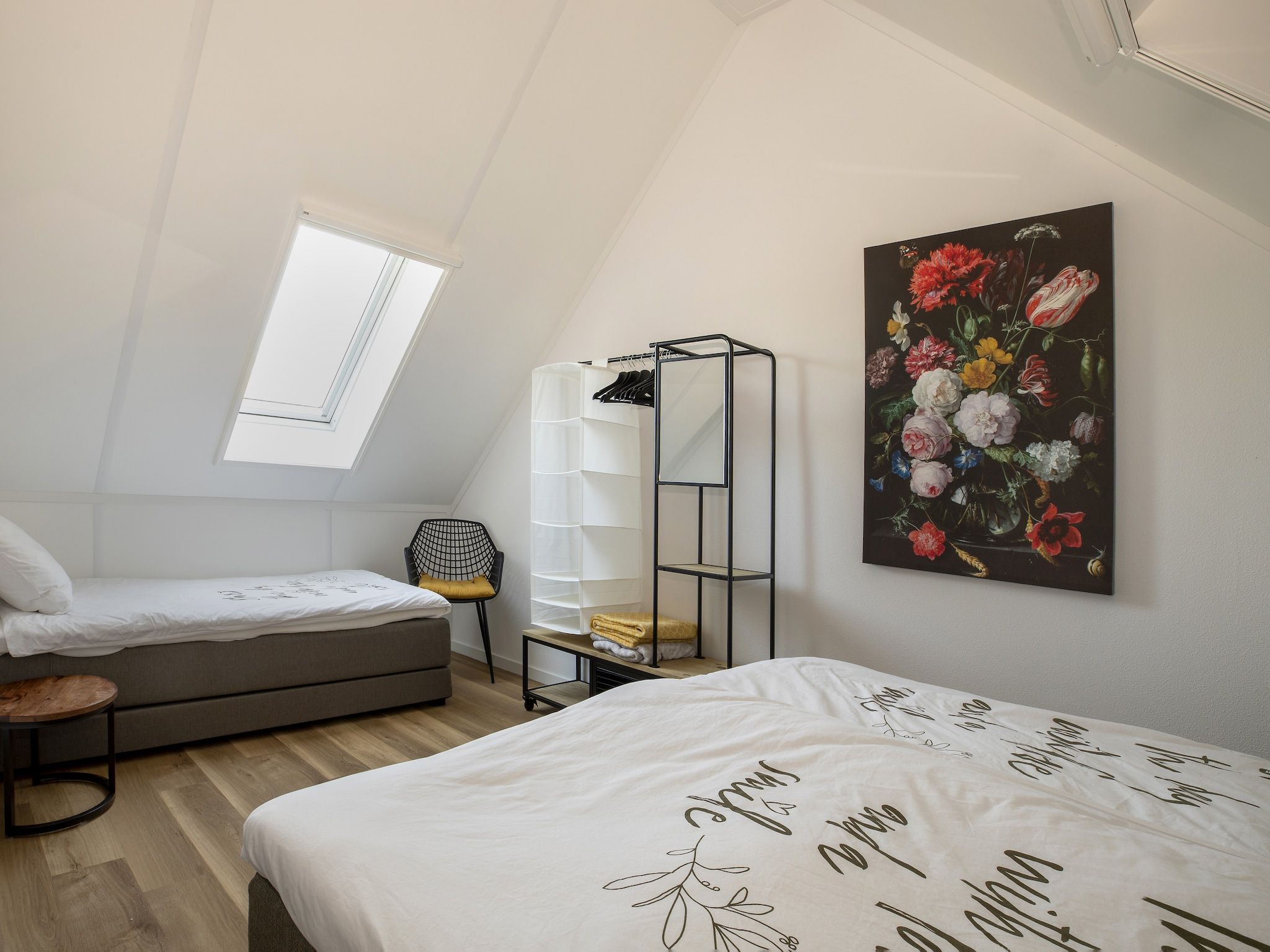 Een slaapkamer van Landgoed Eysinga State 5 in Sint Nicolaasga