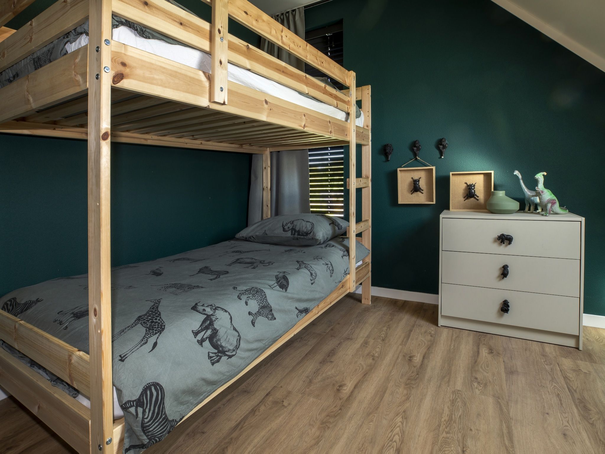 Een slaapkamer van Landgoed Eysinga State 6 in Sint Nicolaasga