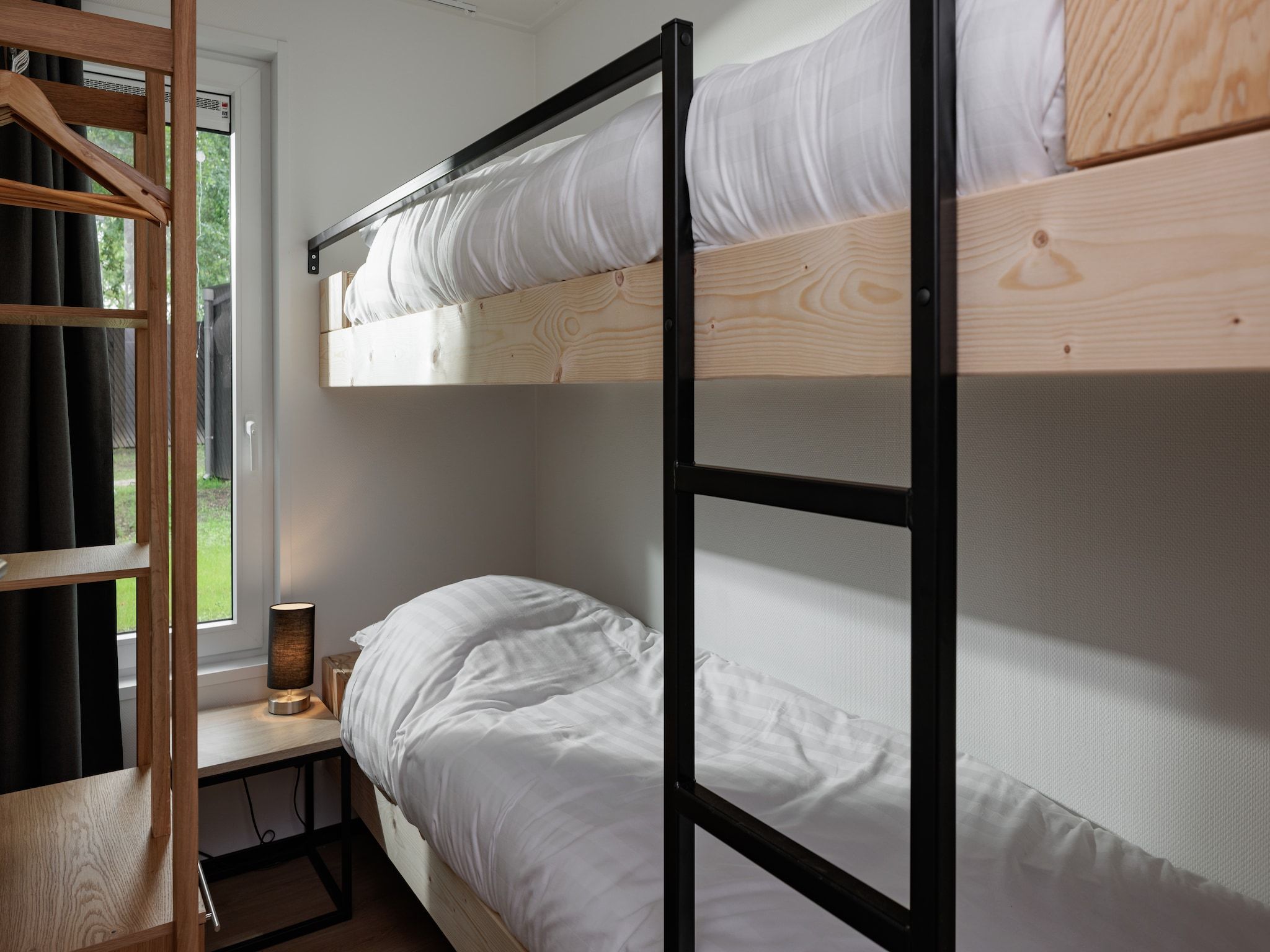 Een slaapkamer van Vakantiepark Schaijk 8 in Schaijk