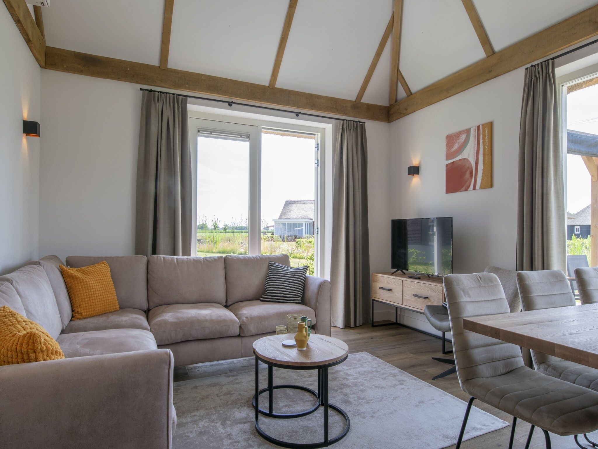 De woonkamer van Vakantiepark De Heihorsten 4 in Someren