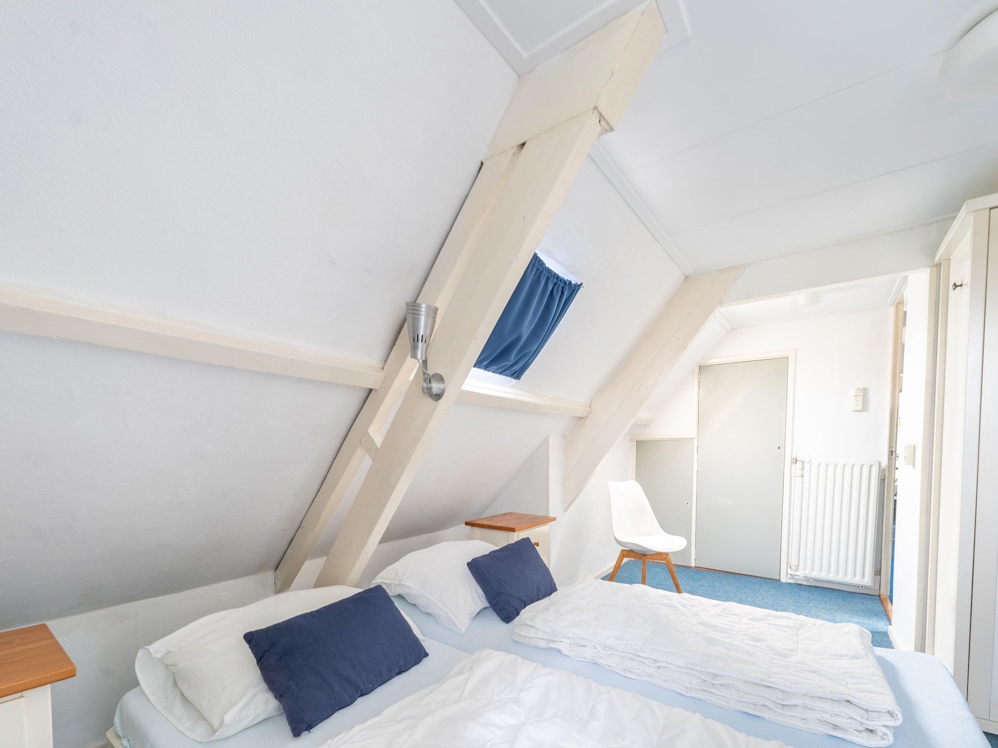 Een slaapkamer van Vakantiehuis Heeg in Heeg