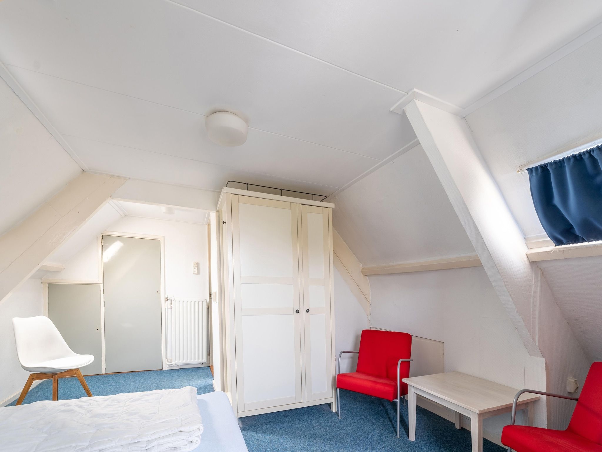 Een slaapkamer van Vakantiehuis Heeg in Heeg