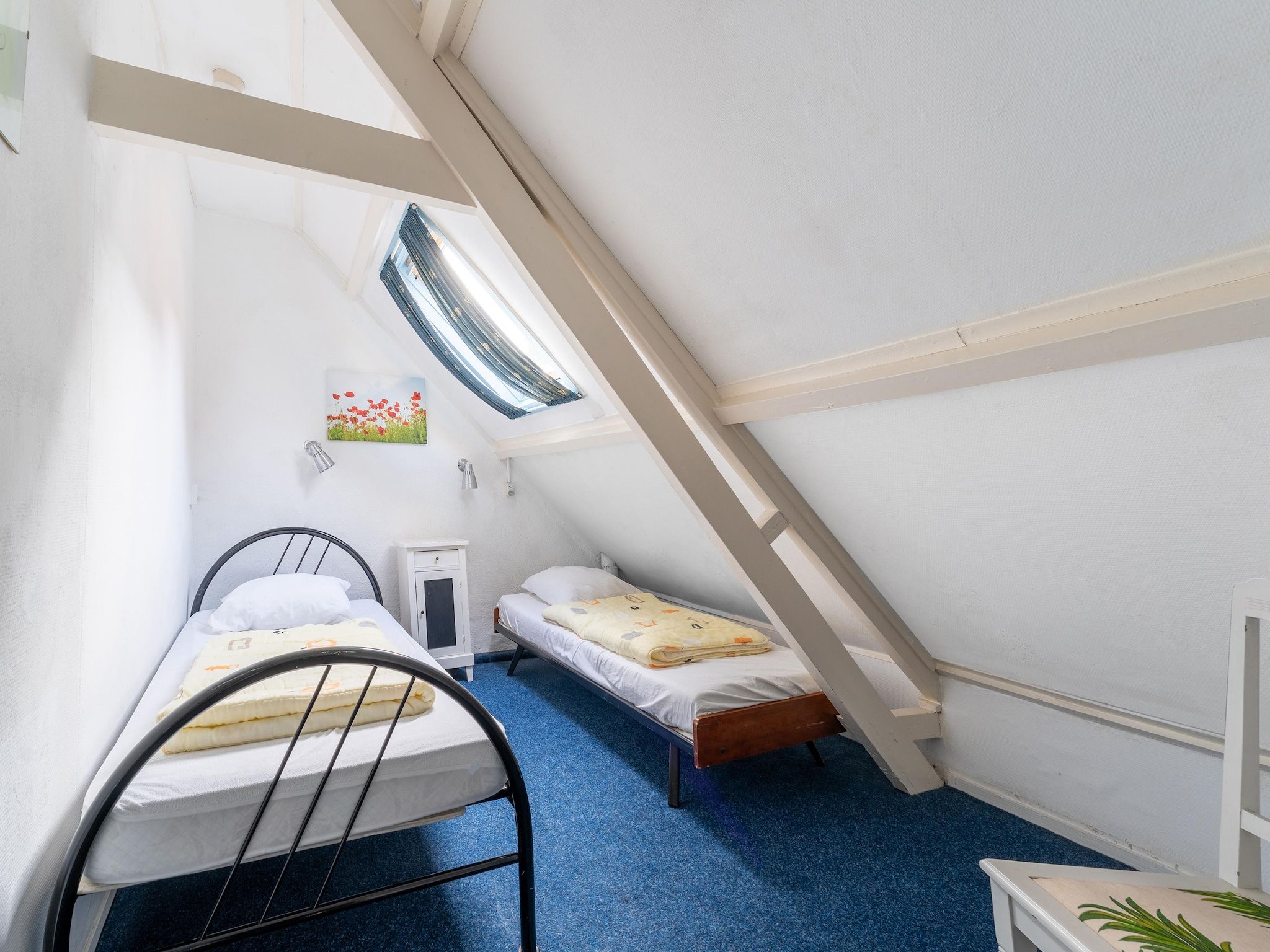 Een slaapkamer van Vakantiehuis Heeg in Heeg