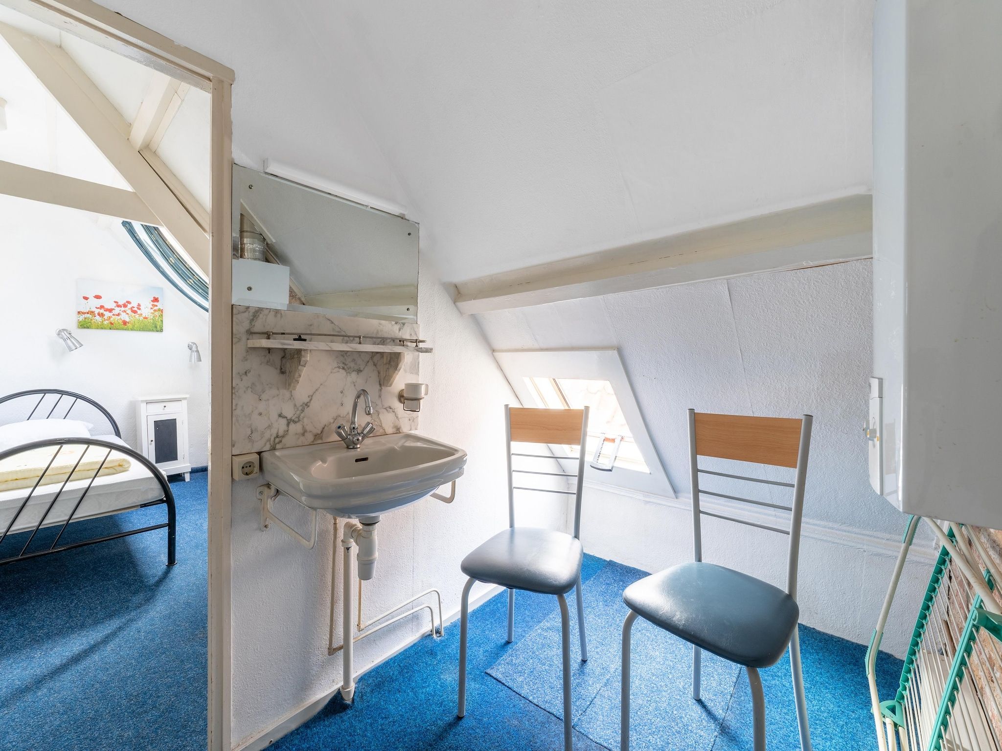 Een slaapkamer van Vakantiehuis Heeg in Heeg