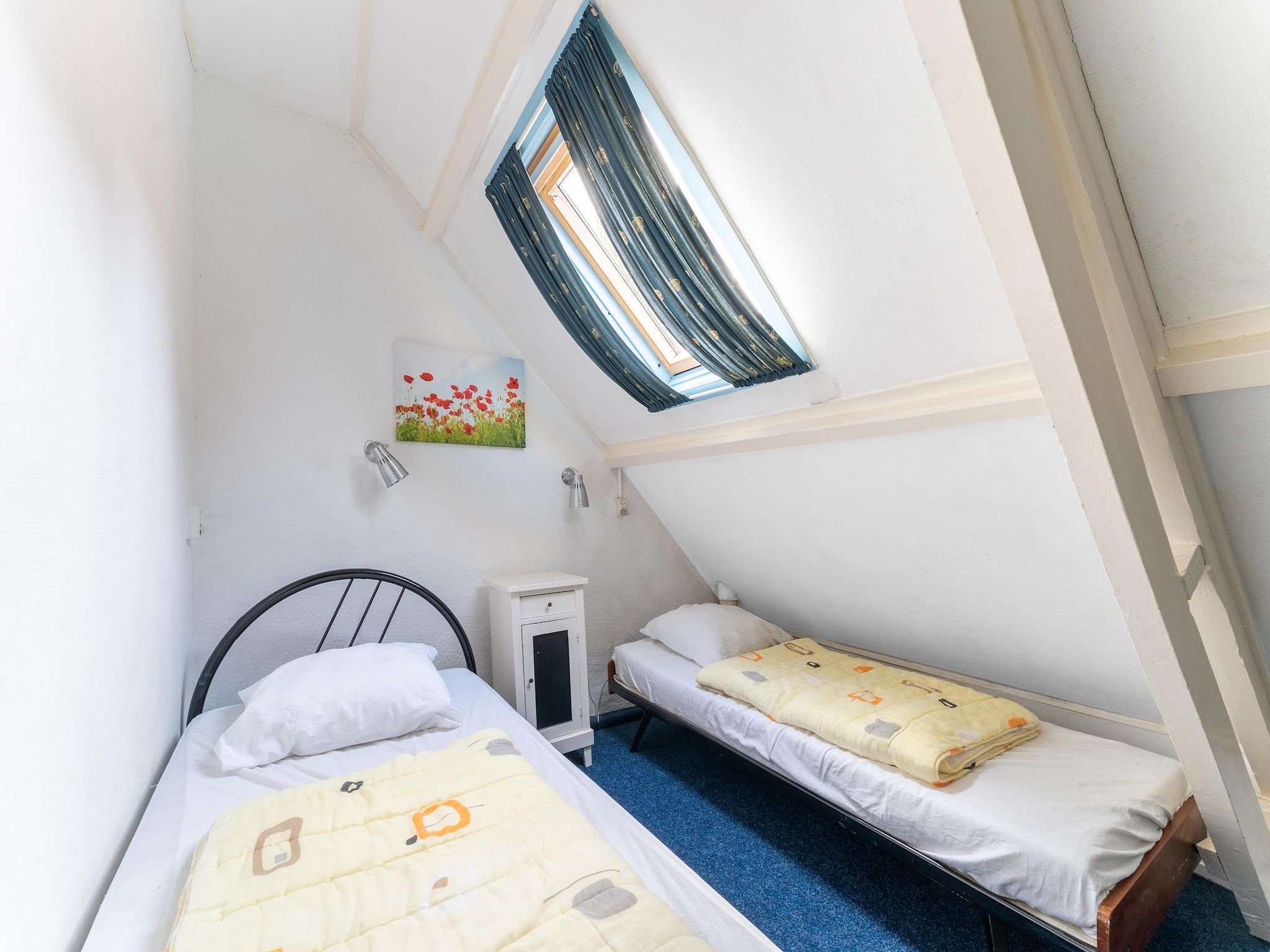 Een slaapkamer van Vakantiehuis Heeg in Heeg