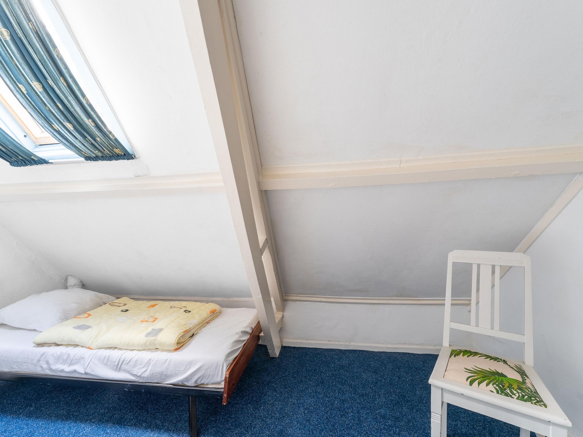 Een slaapkamer van Vakantiehuis Heeg in Heeg