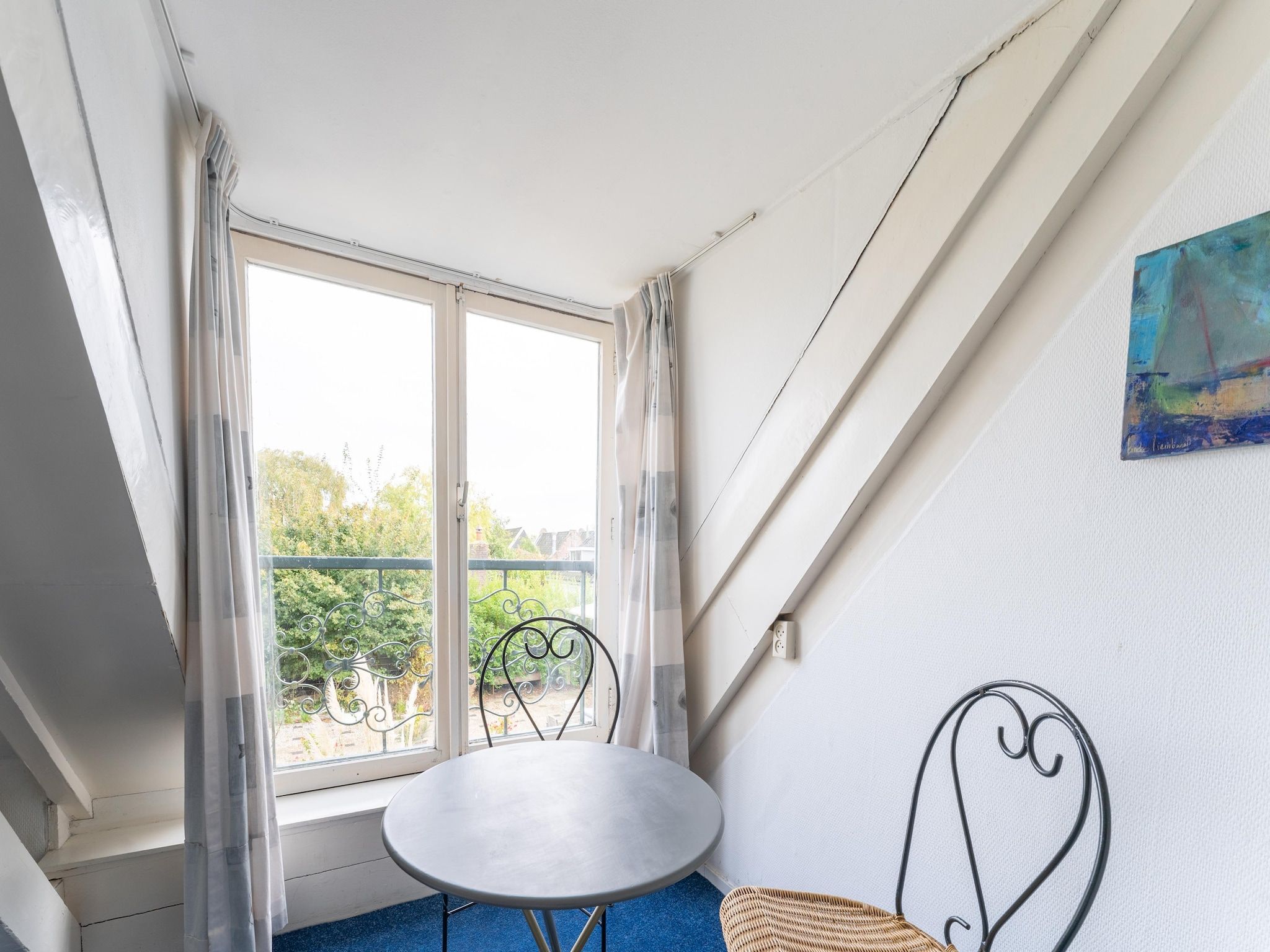 Een slaapkamer van Vakantiehuis Heeg in Heeg