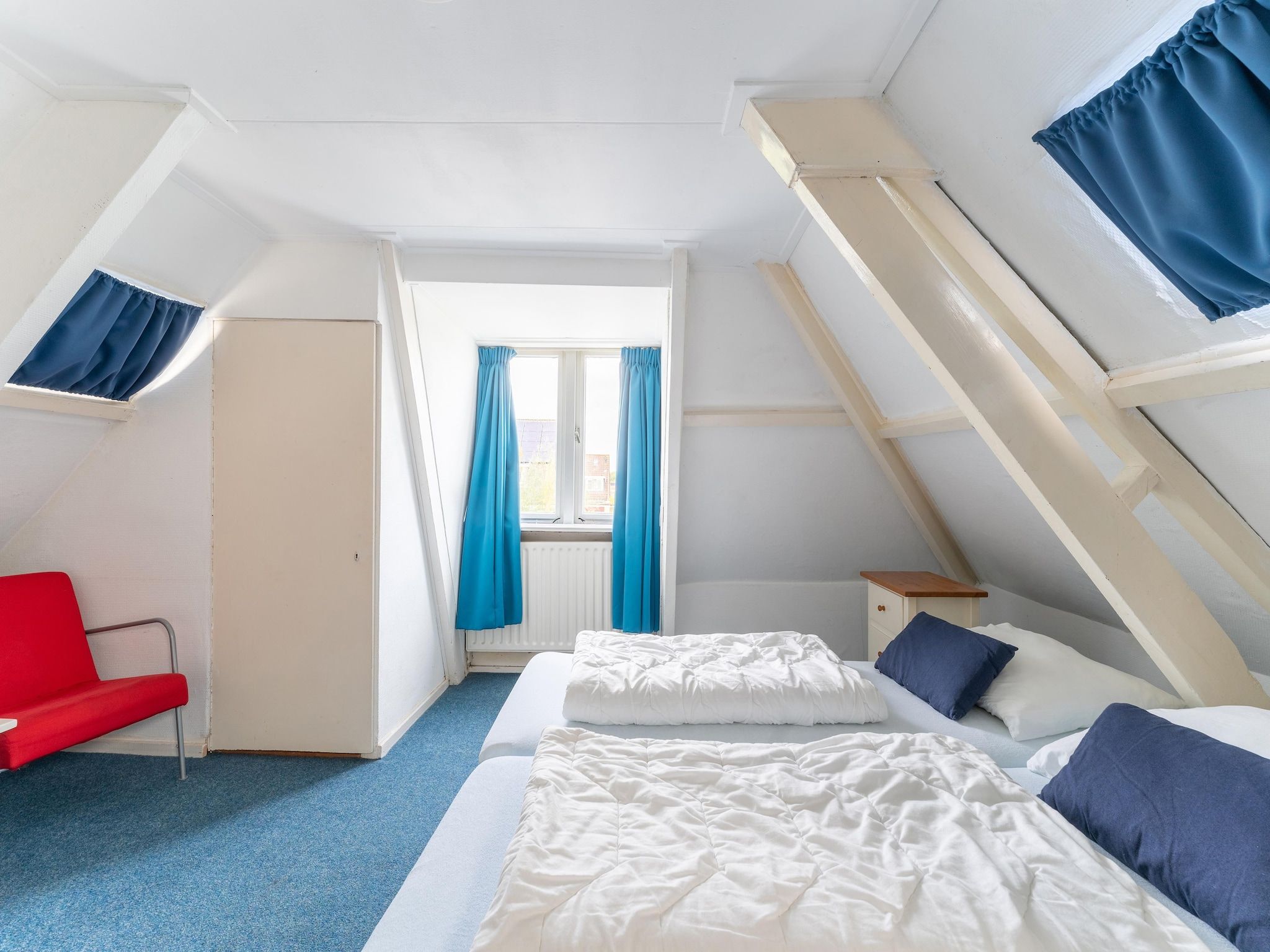 Een slaapkamer van Vakantiehuis Heeg in Heeg