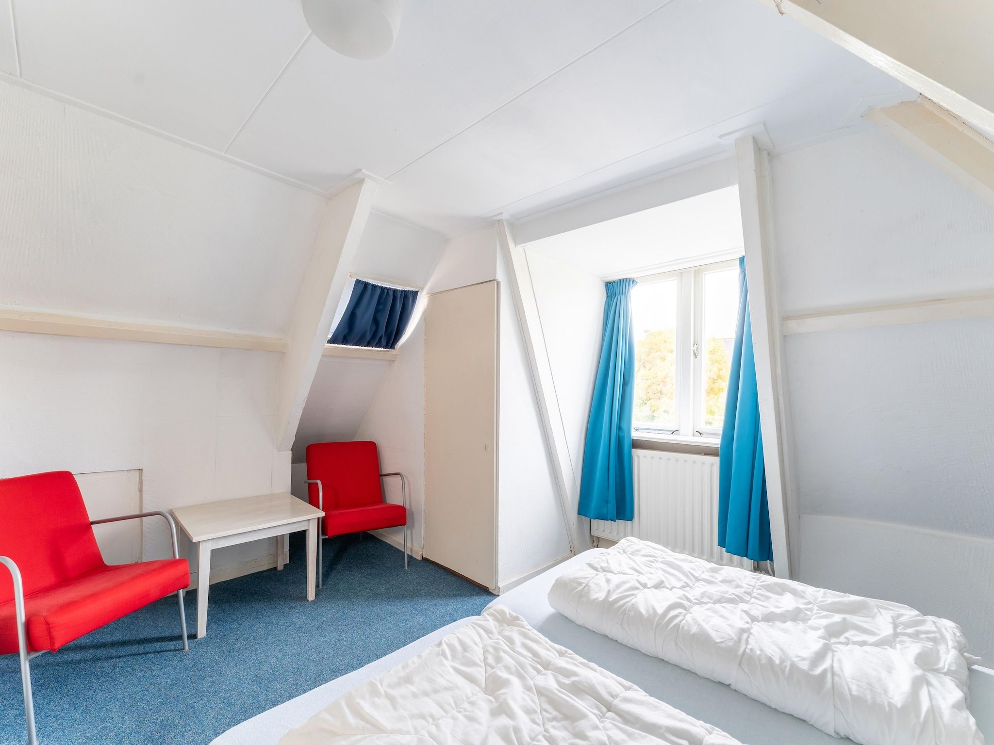 Een slaapkamer van Vakantiehuis Heeg in Heeg