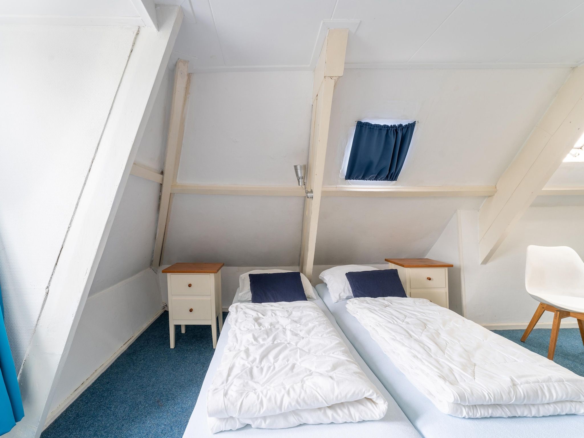 Een slaapkamer van Vakantiehuis Heeg in Heeg