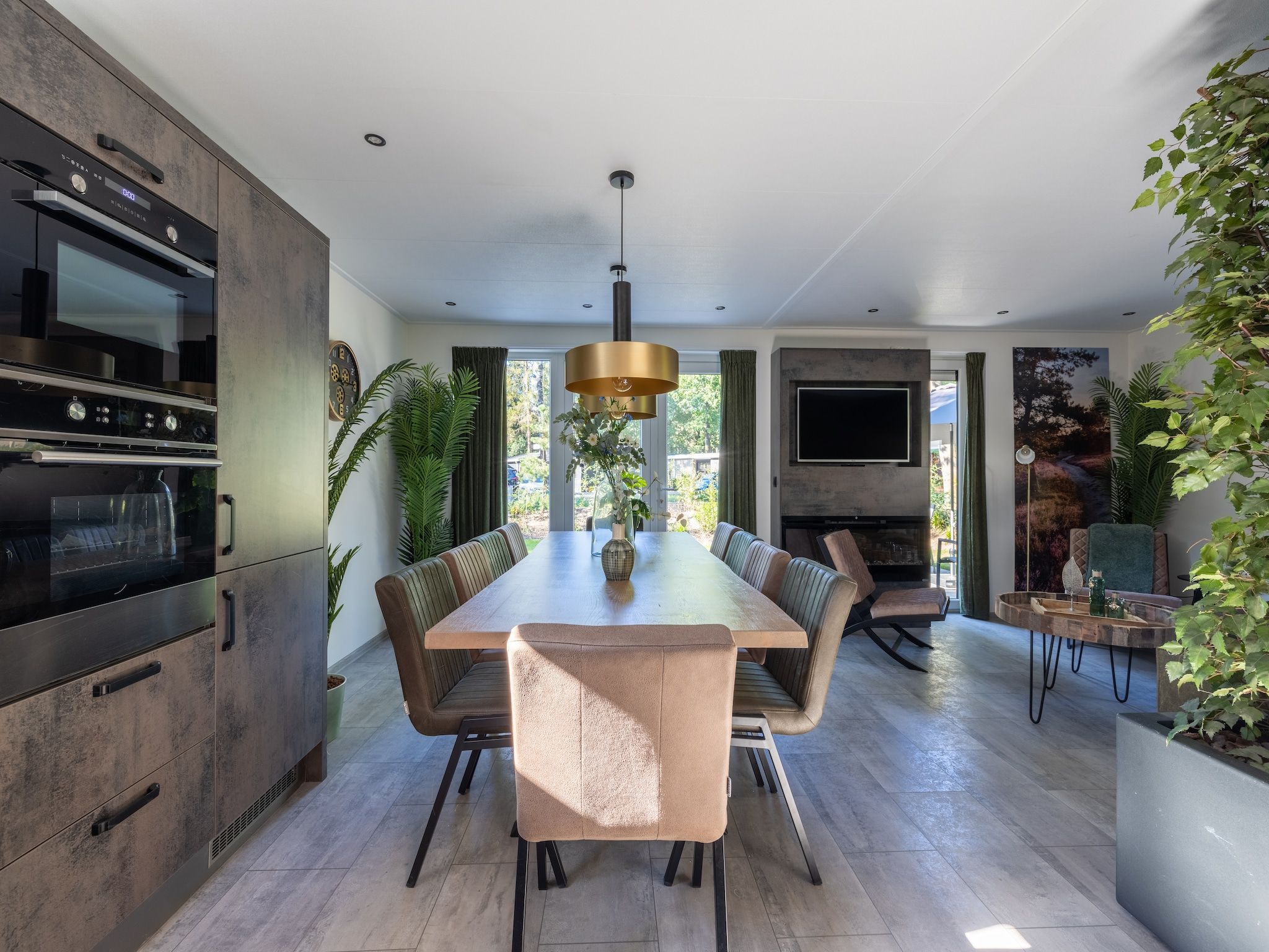 De woonkamer van Vakantiepark De Rimboe & De Woeste Hoogte 38 in Hoenderloo