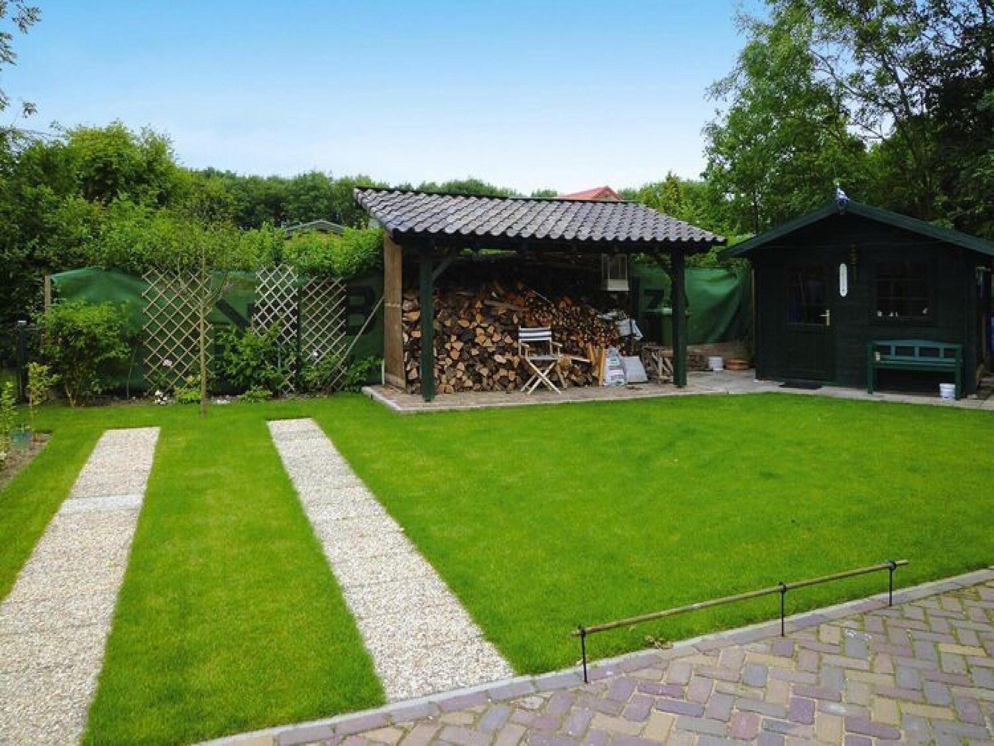 De tuin van Strandwoning Baarland in Zeeland in Baarland