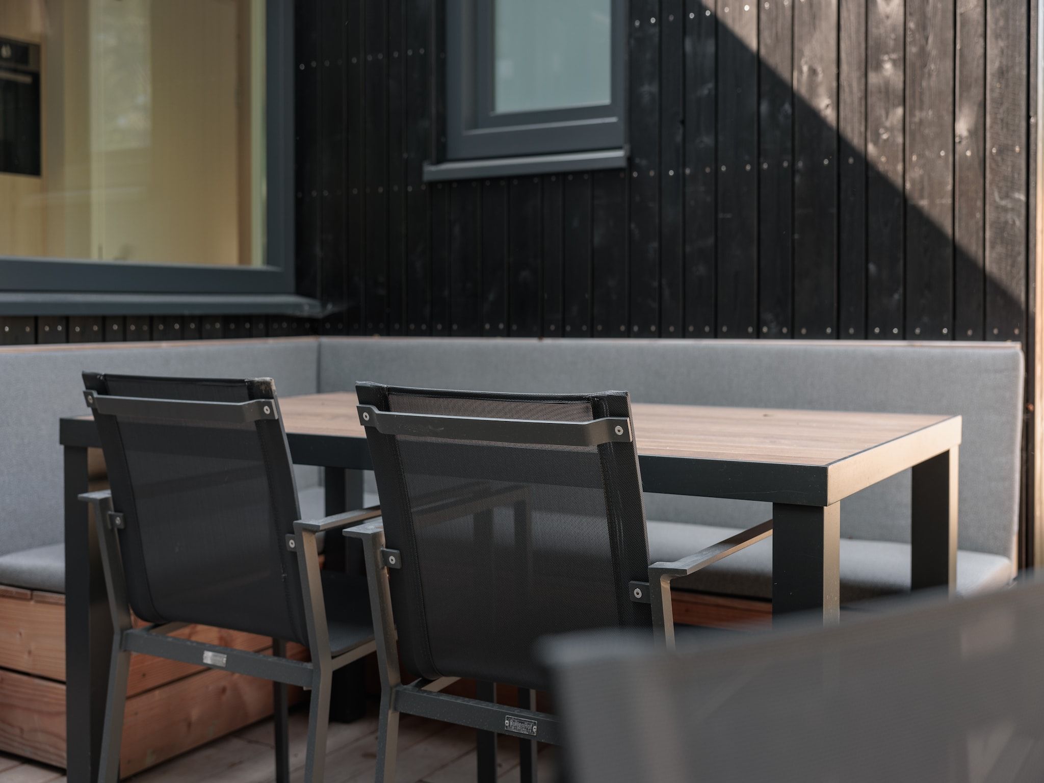 Het terras van Noordzee Résidence De Banjaard 23 in Kamperland