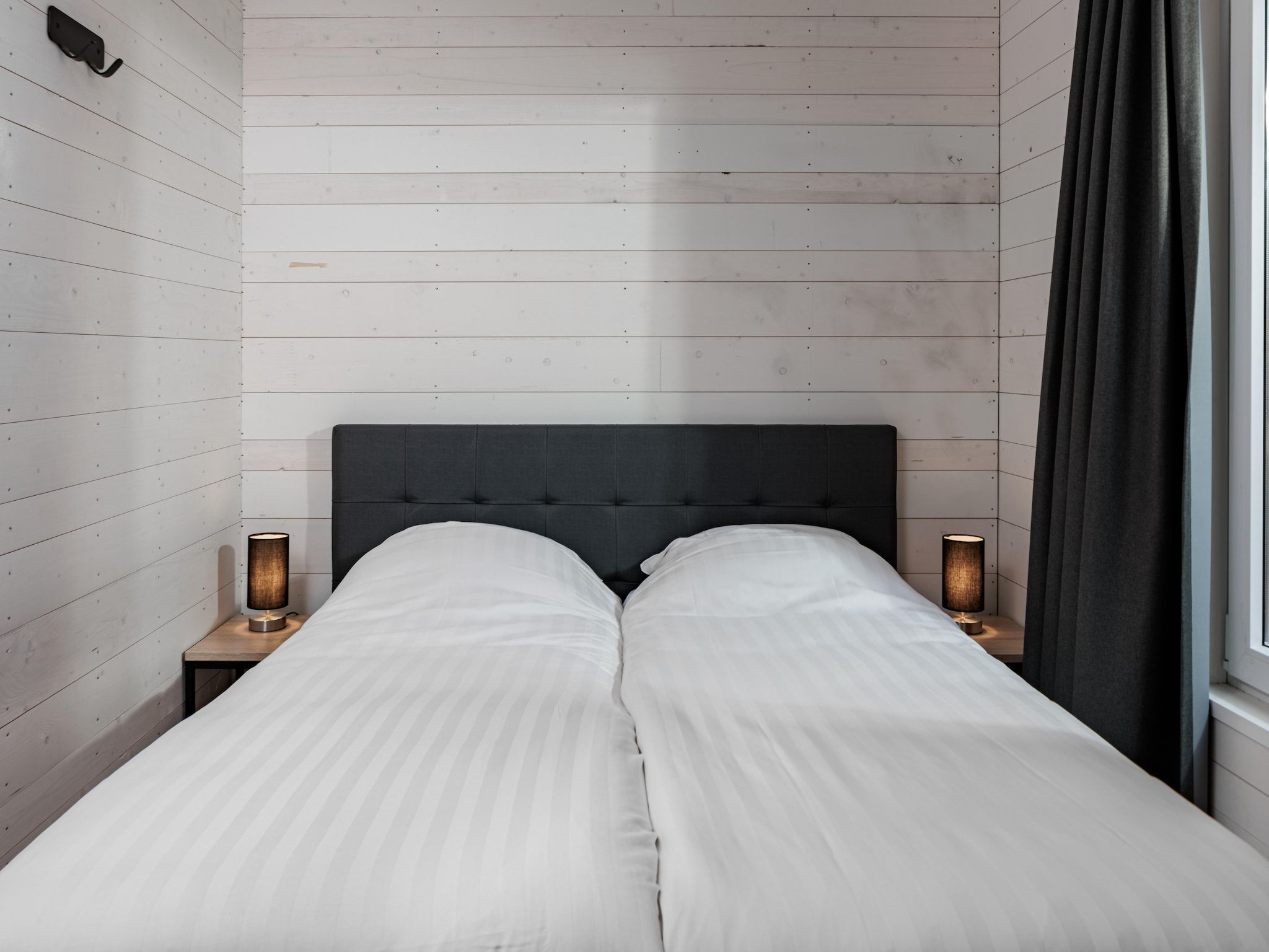 Een slaapkamer van Vakantiepark Schaijk 9 in Schaijk