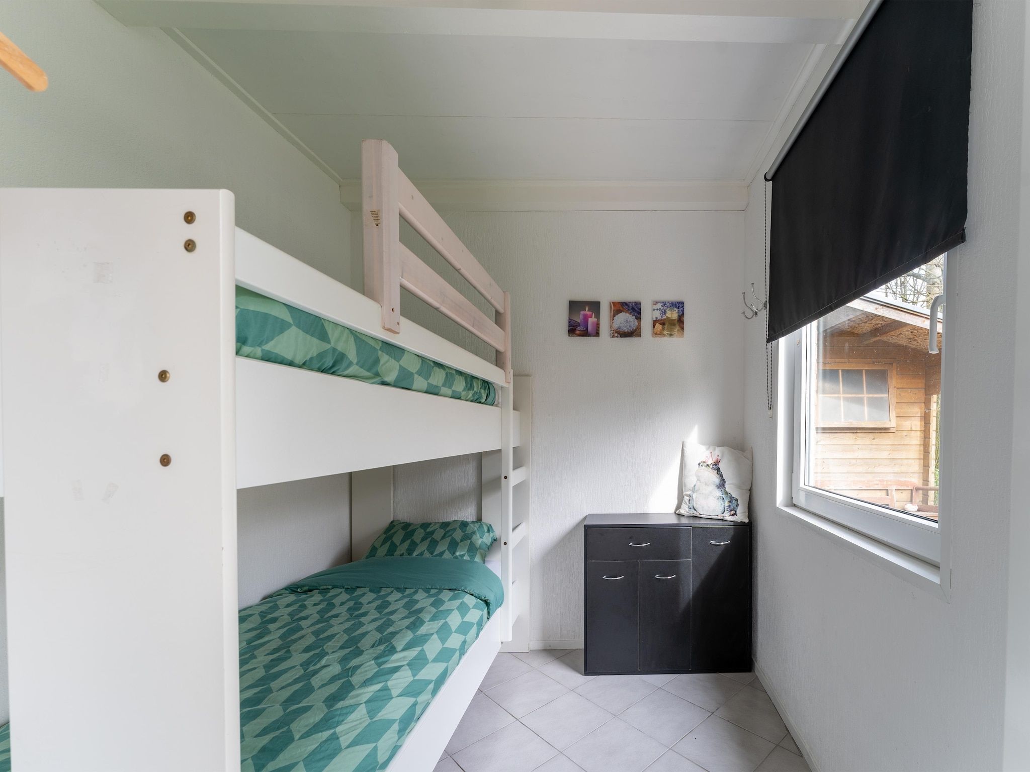Een slaapkamer van Scheldeoord 97 in Baarland