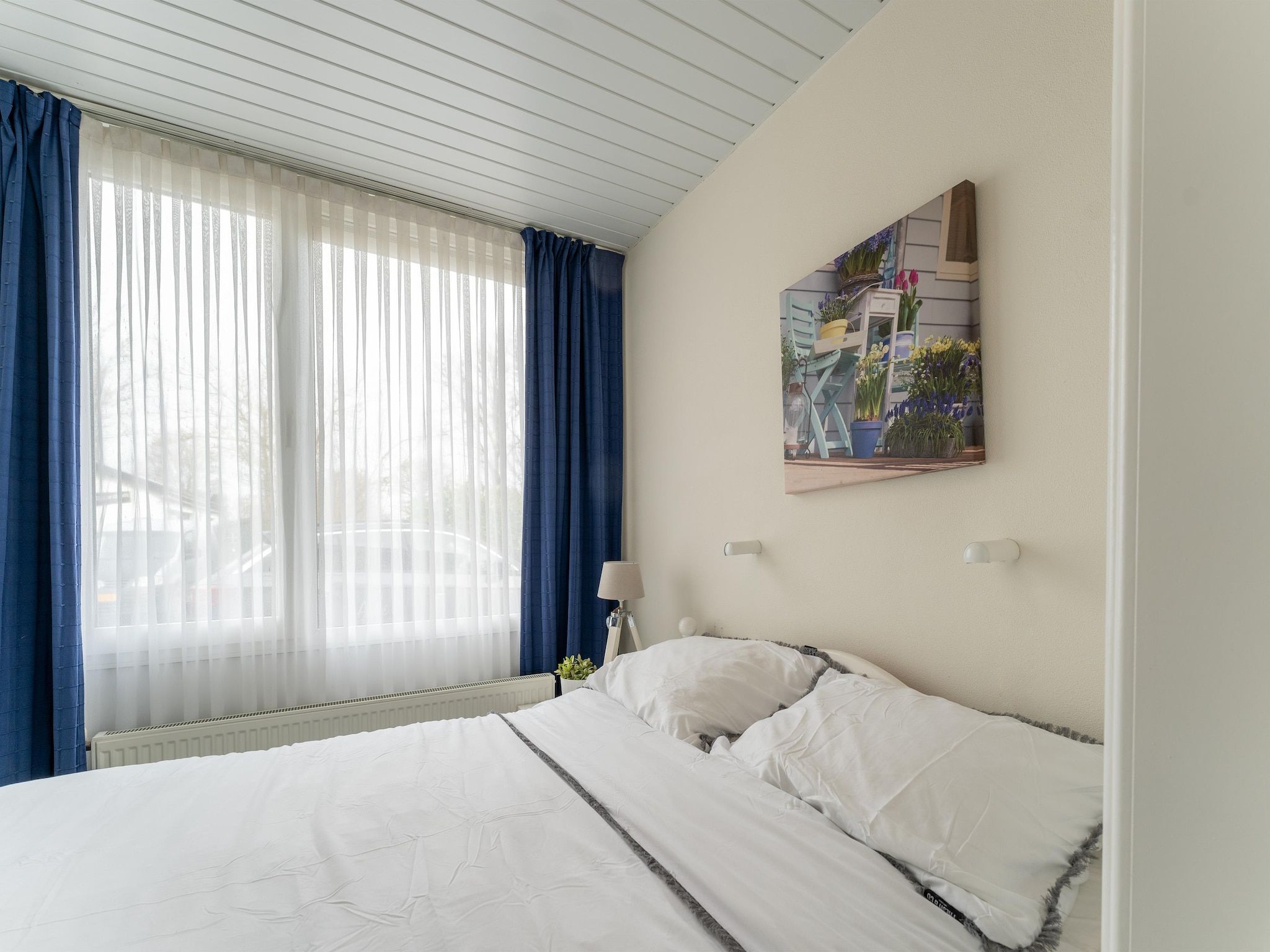 Een slaapkamer van Scheldeoord 70 in Baarland