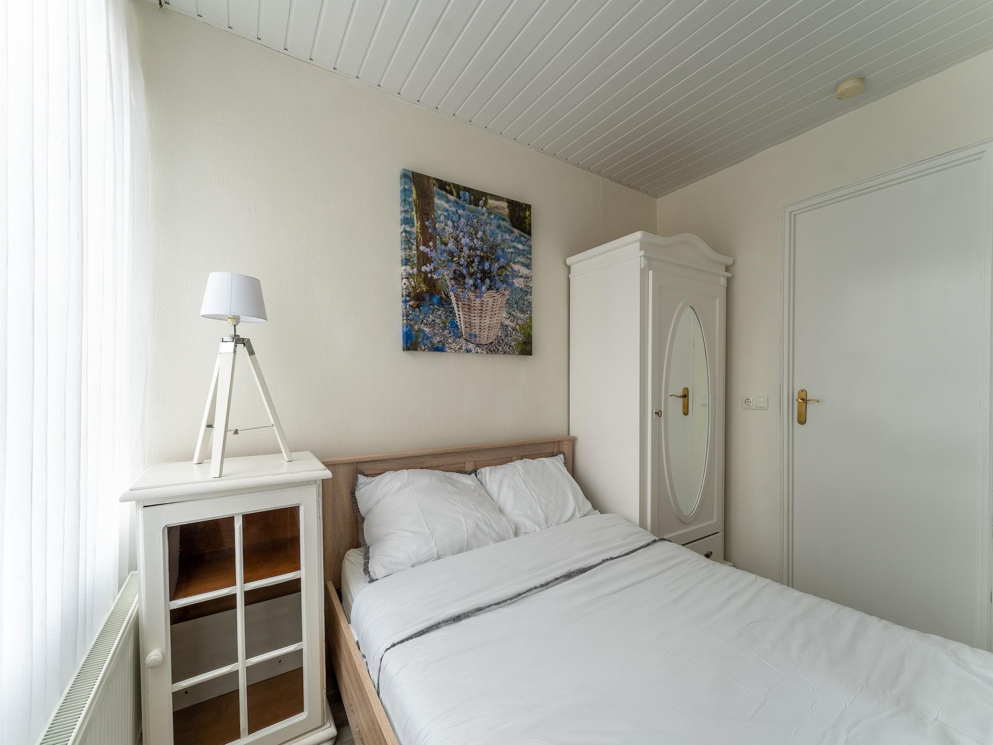 Een slaapkamer van Scheldeoord 70 in Baarland