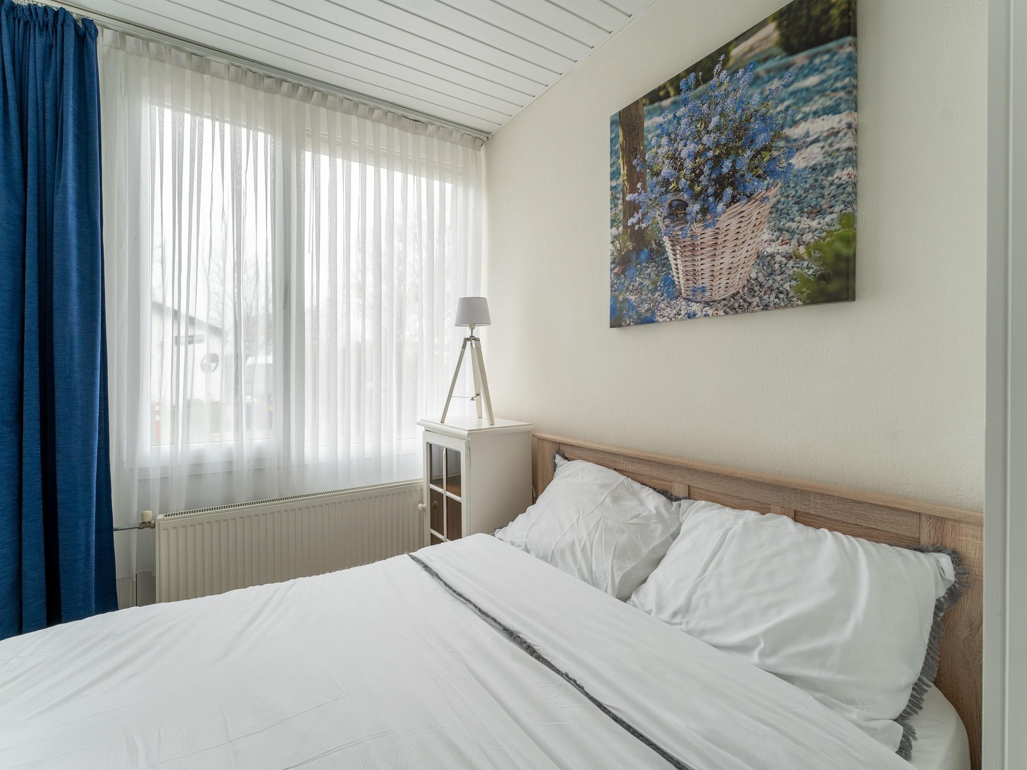 Een slaapkamer van Scheldeoord 70 in Baarland