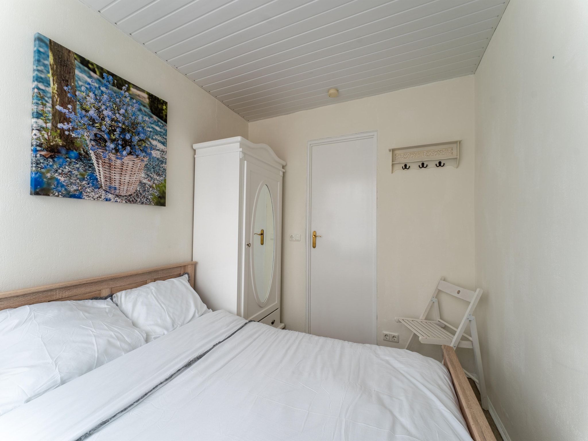 Een slaapkamer van Scheldeoord 70 in Baarland