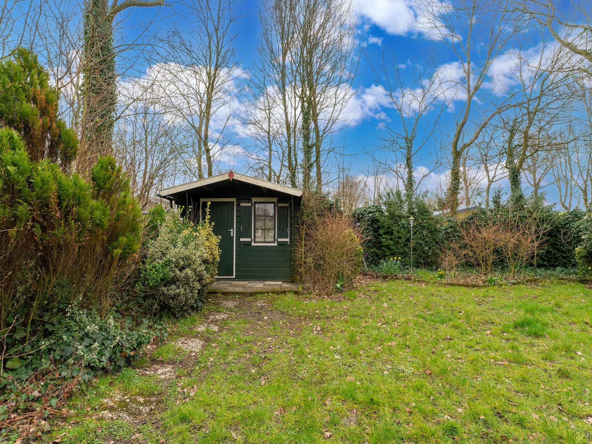 De tuin van Scheldeoord 70 in Baarland