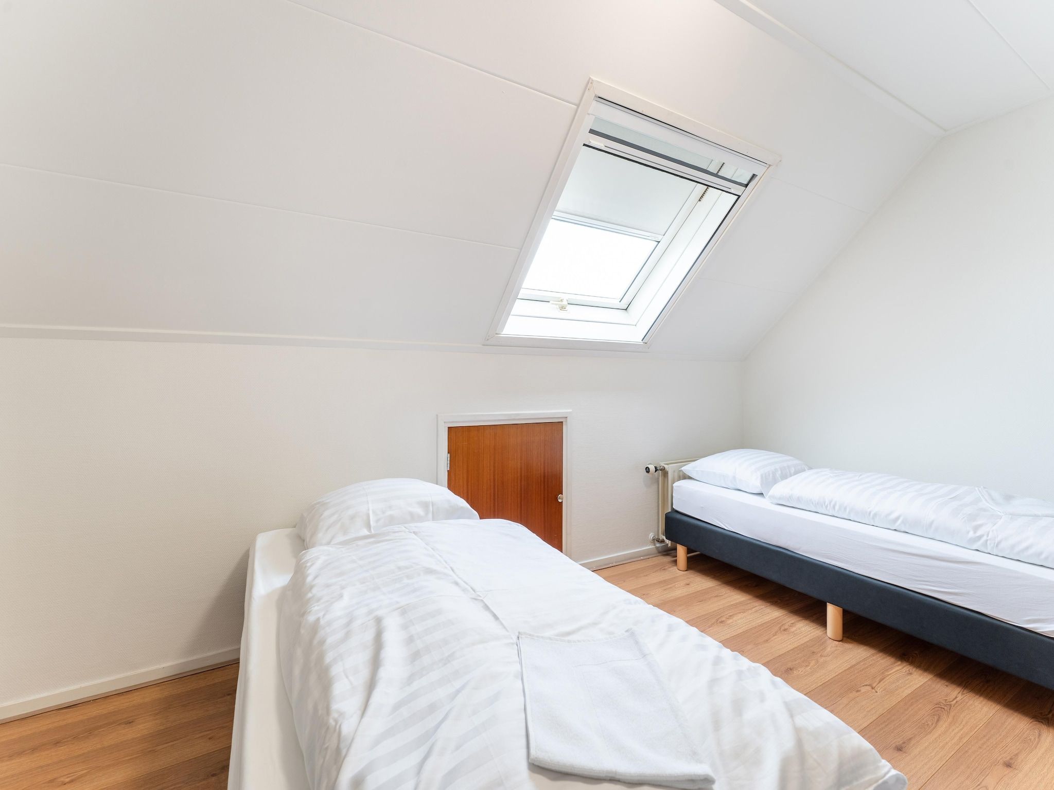 Een slaapkamer van Genieten in Silvolde II in Silvolde