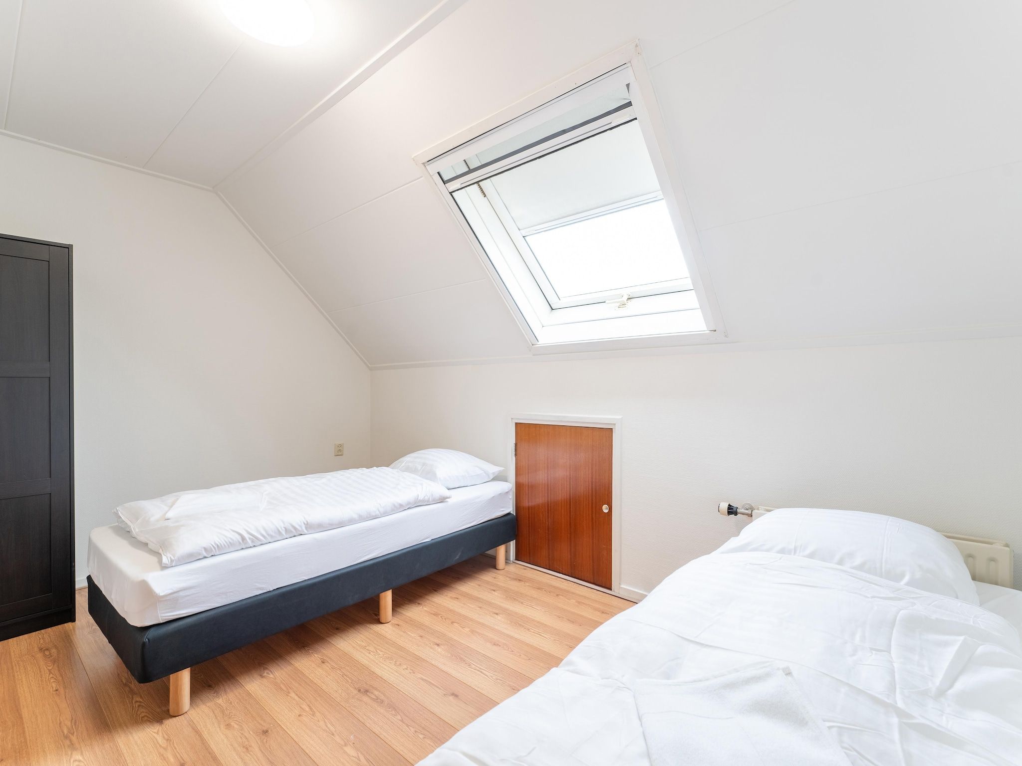 Een slaapkamer van Genieten in Silvolde II in Silvolde