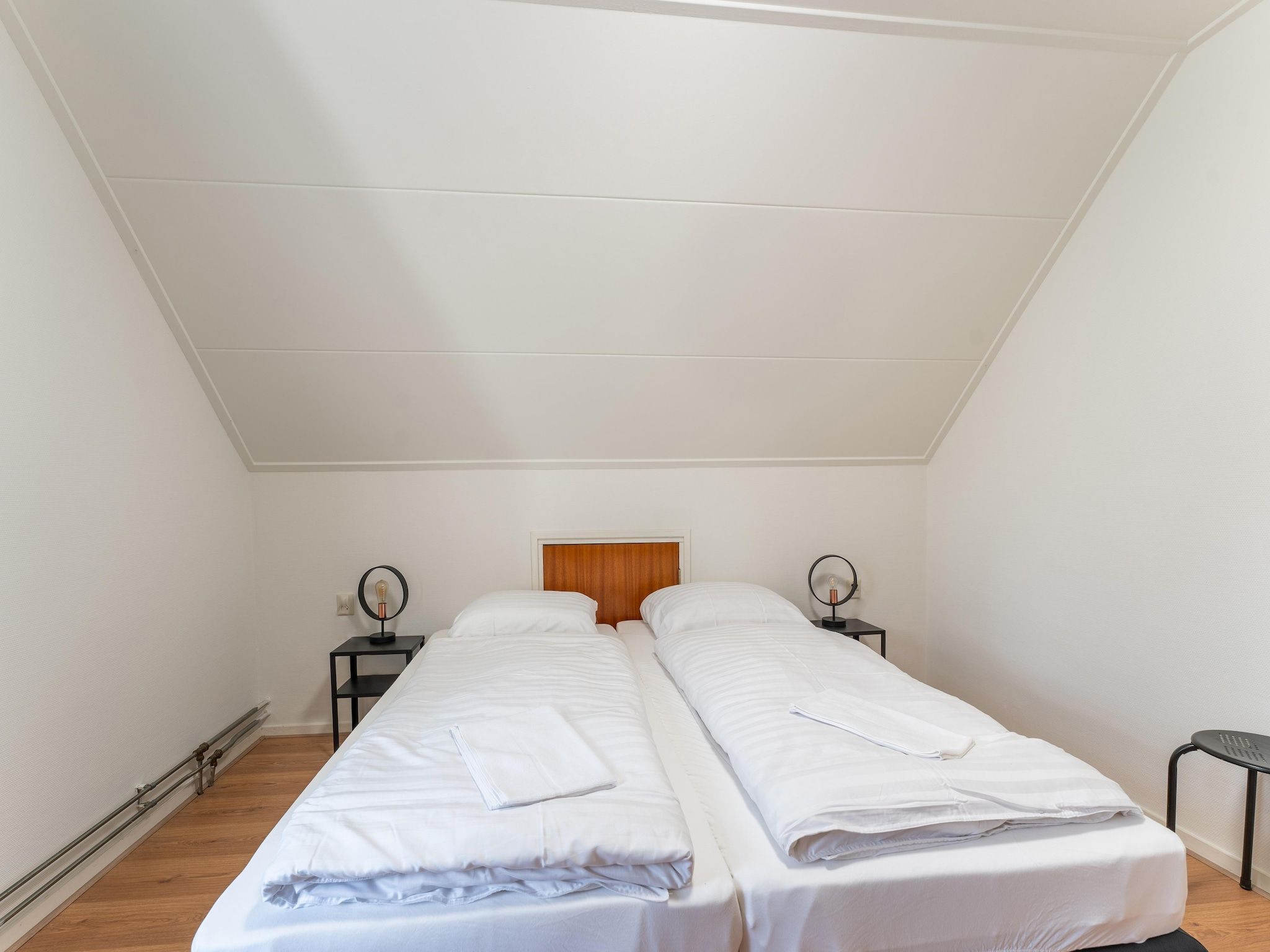 Een slaapkamer van Genieten in Silvolde II in Silvolde