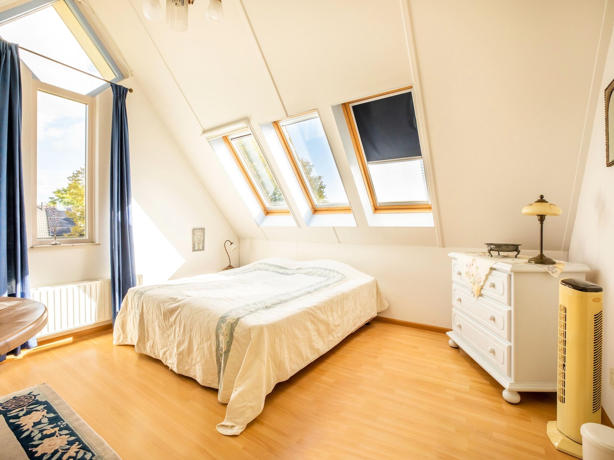 Een slaapkamer van Vakantiewoning Blauw in Hoorn