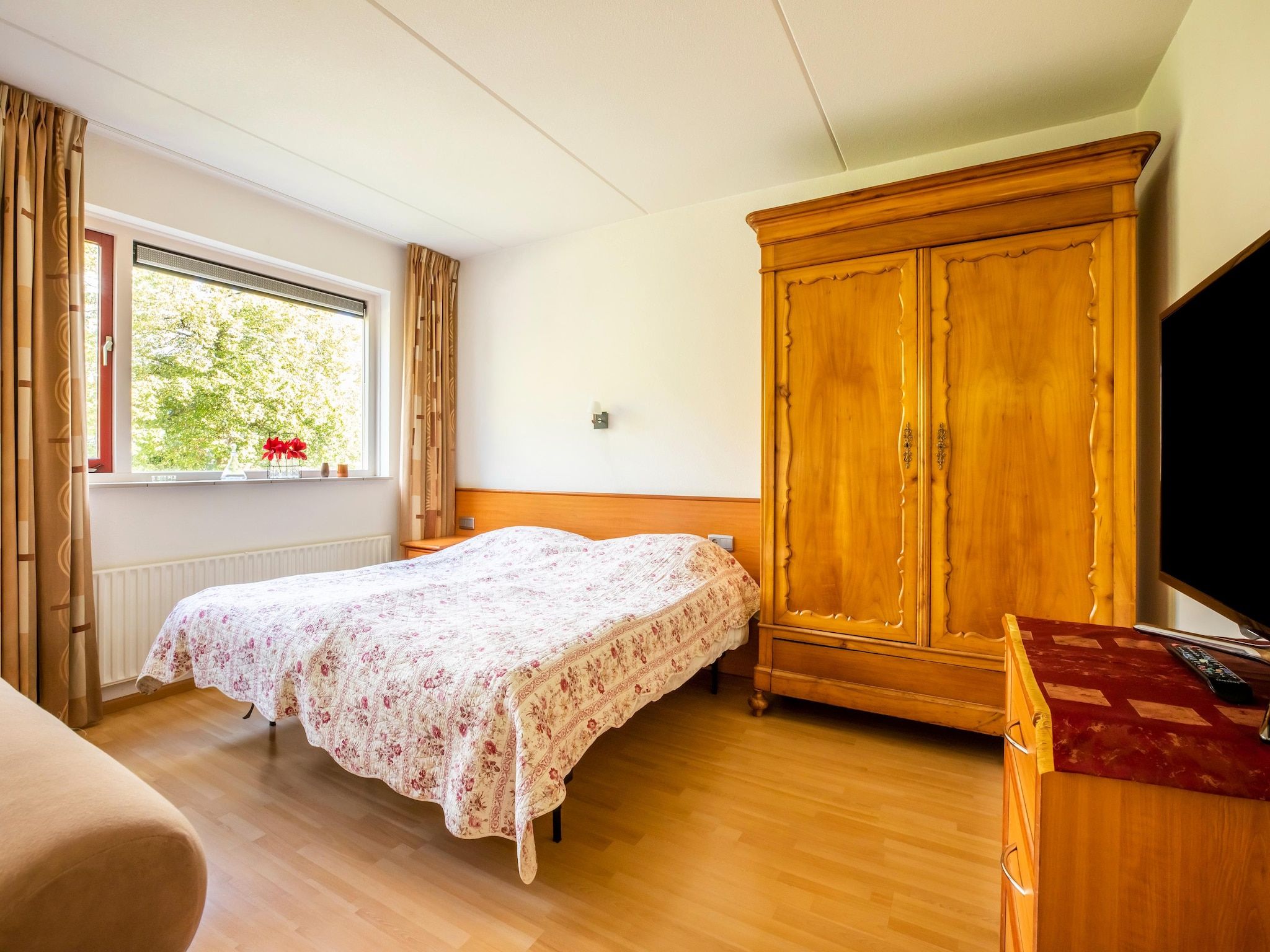 Een slaapkamer van Vakantiewoning Blauw in Hoorn