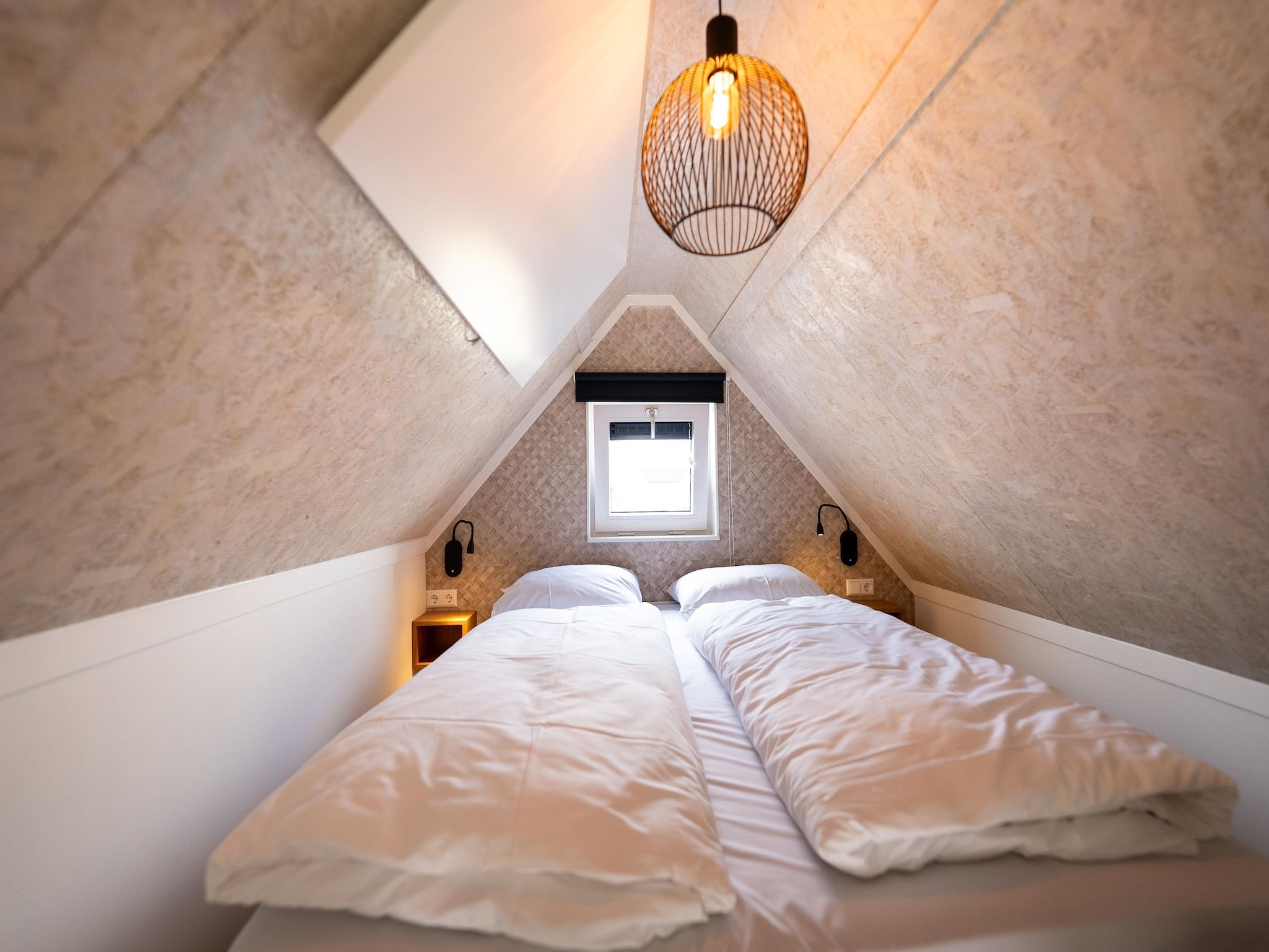 Een slaapkamer van Vakantiepark Zeebad 13 in Breskens