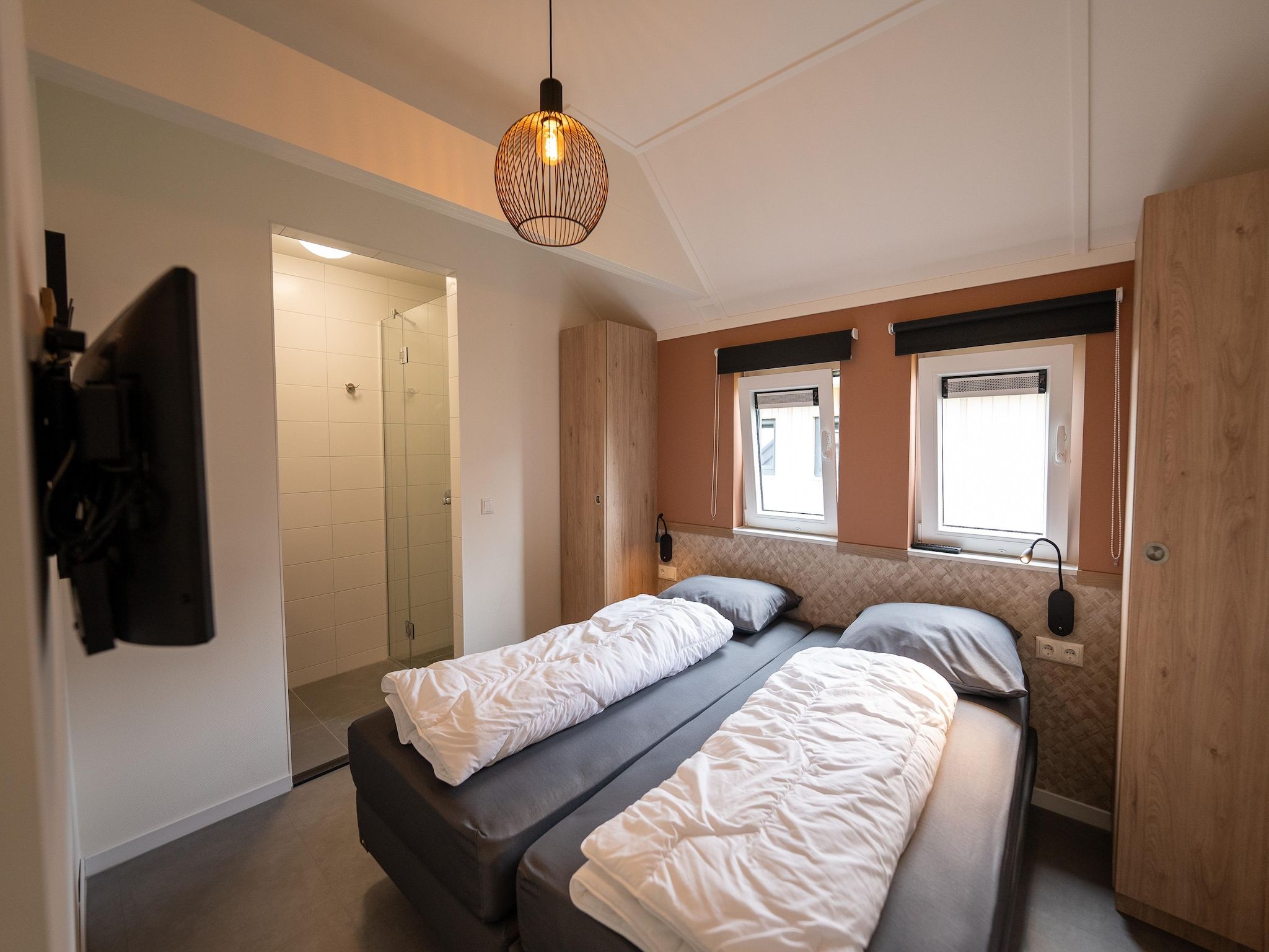 Een slaapkamer van Vakantiepark Zeebad 16 in Breskens