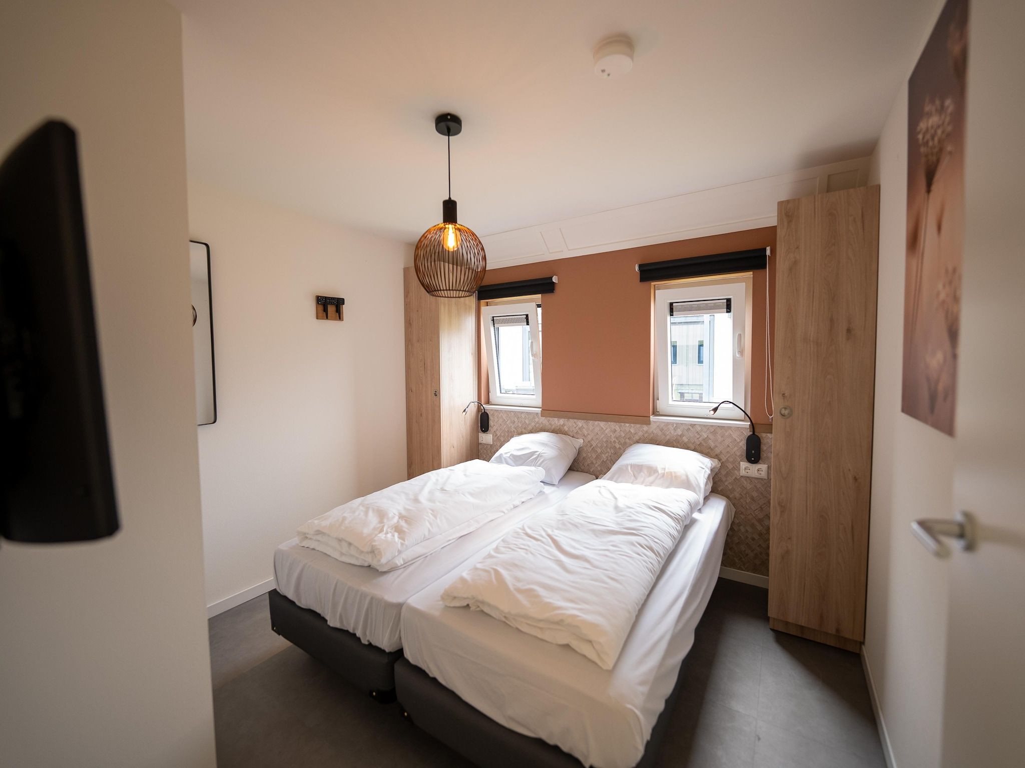 Een slaapkamer van Vakantiepark Zeebad 17 in Breskens