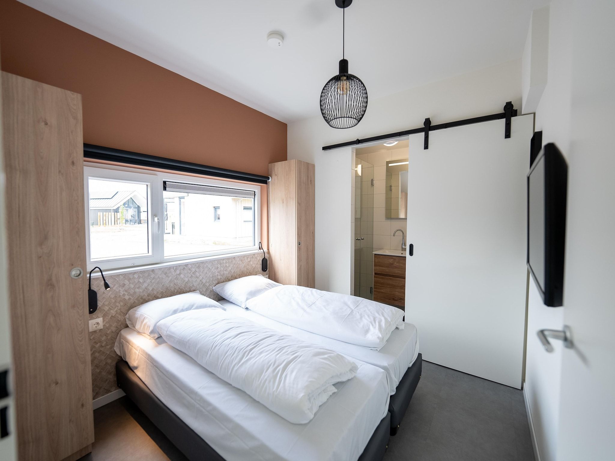 Een slaapkamer van Vakantiepark Zeebad 18 in Breskens