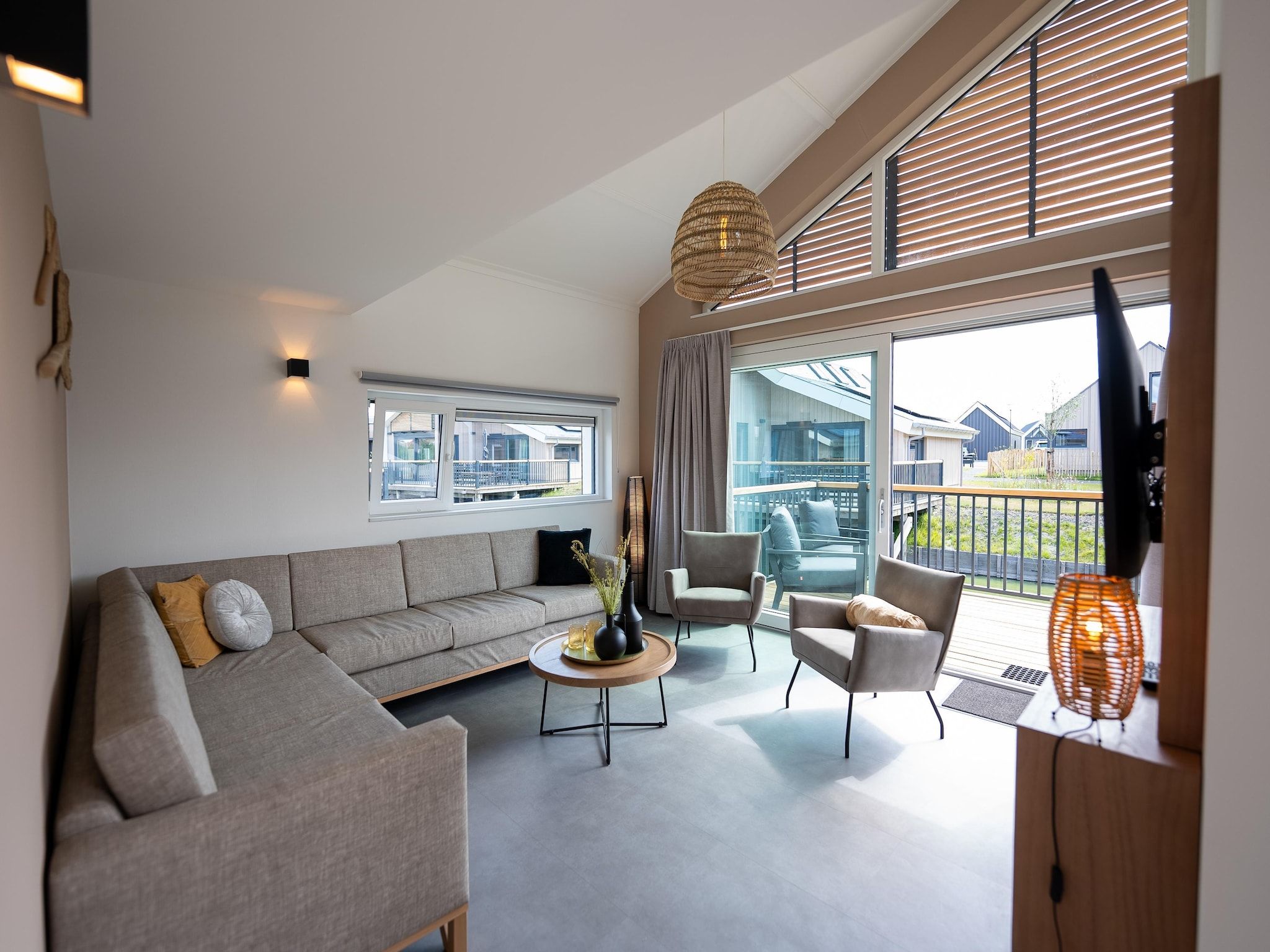 De woonkamer van Vakantiepark Zeebad 19 in Breskens