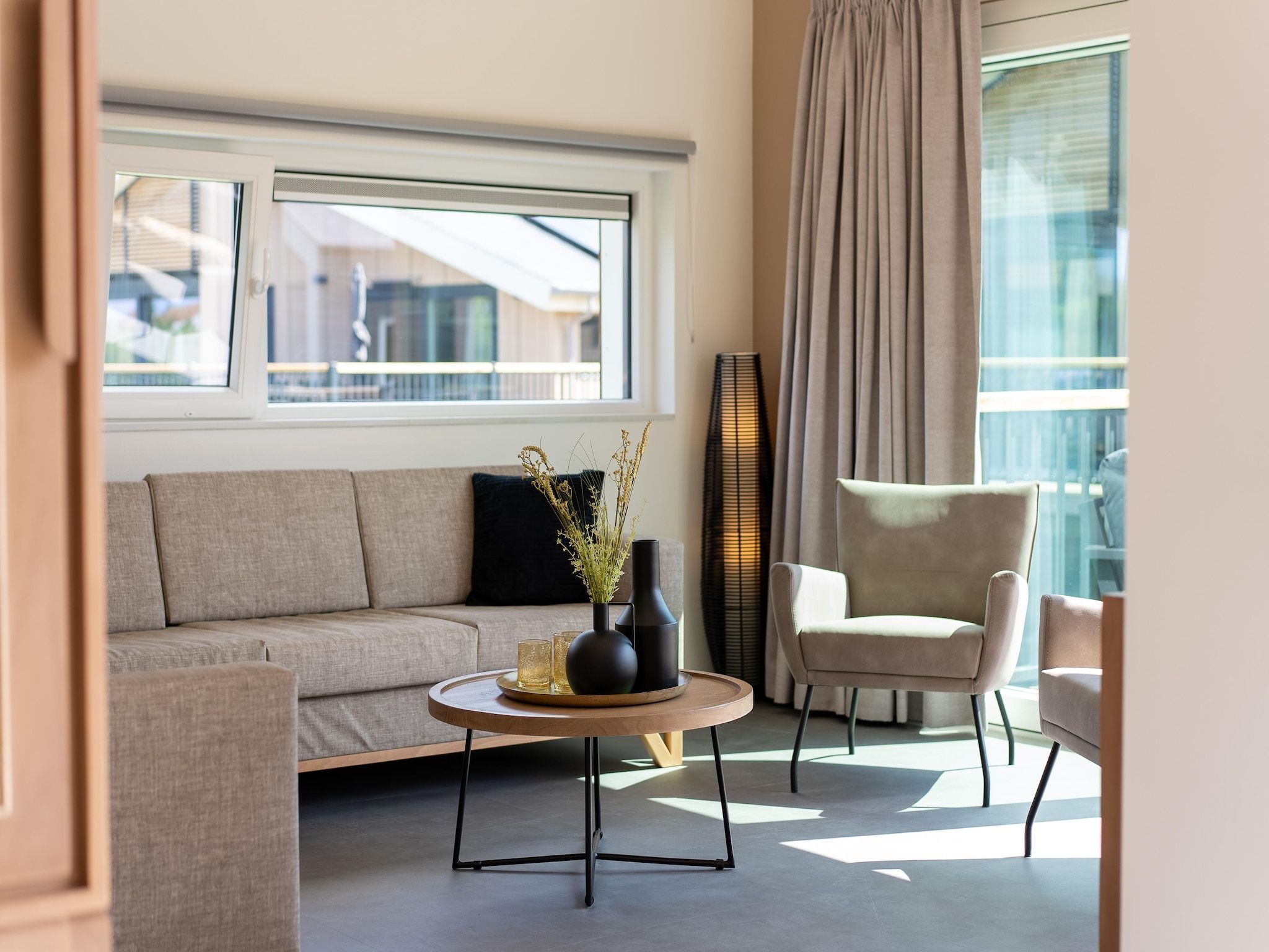 De woonkamer van Vakantiepark Zeebad 19 in Breskens