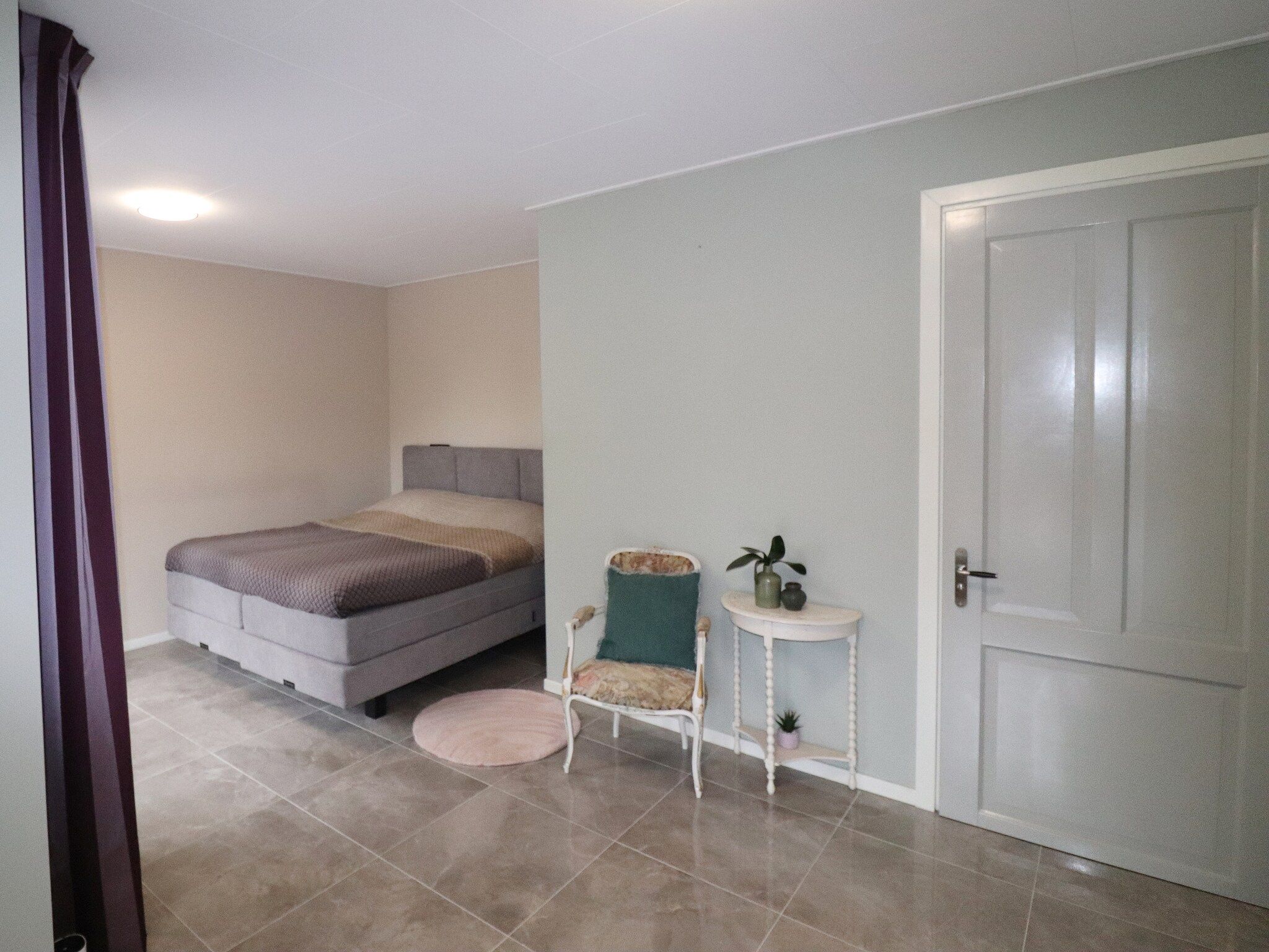 Een slaapkamer van Appartement Notenbomer in Kornhorn