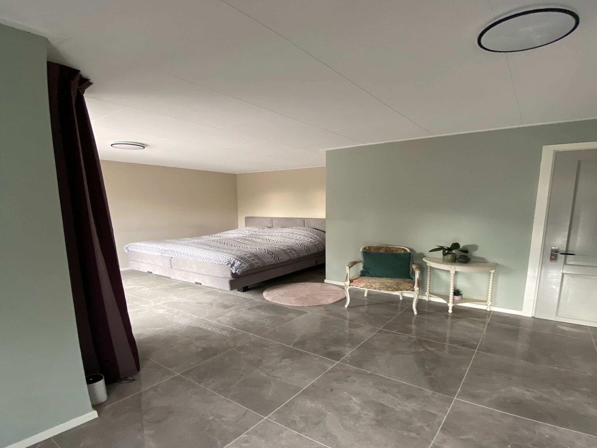 Een slaapkamer van Appartement Notenbomer in Kornhorn