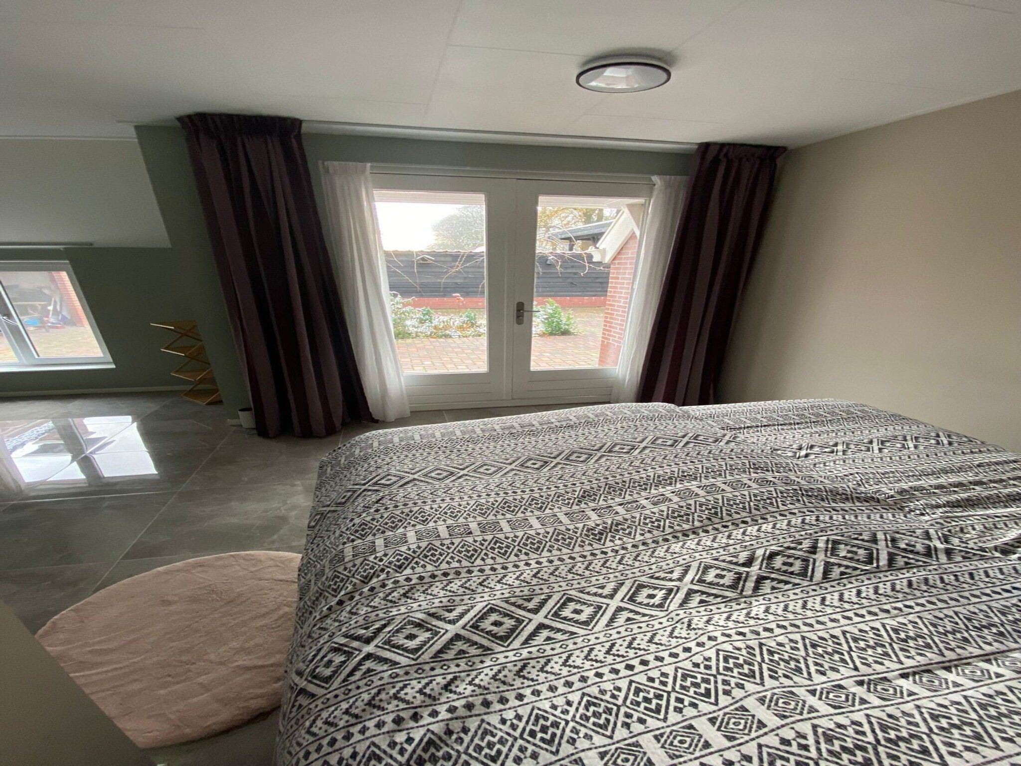 Een slaapkamer van Appartement Notenbomer in Kornhorn