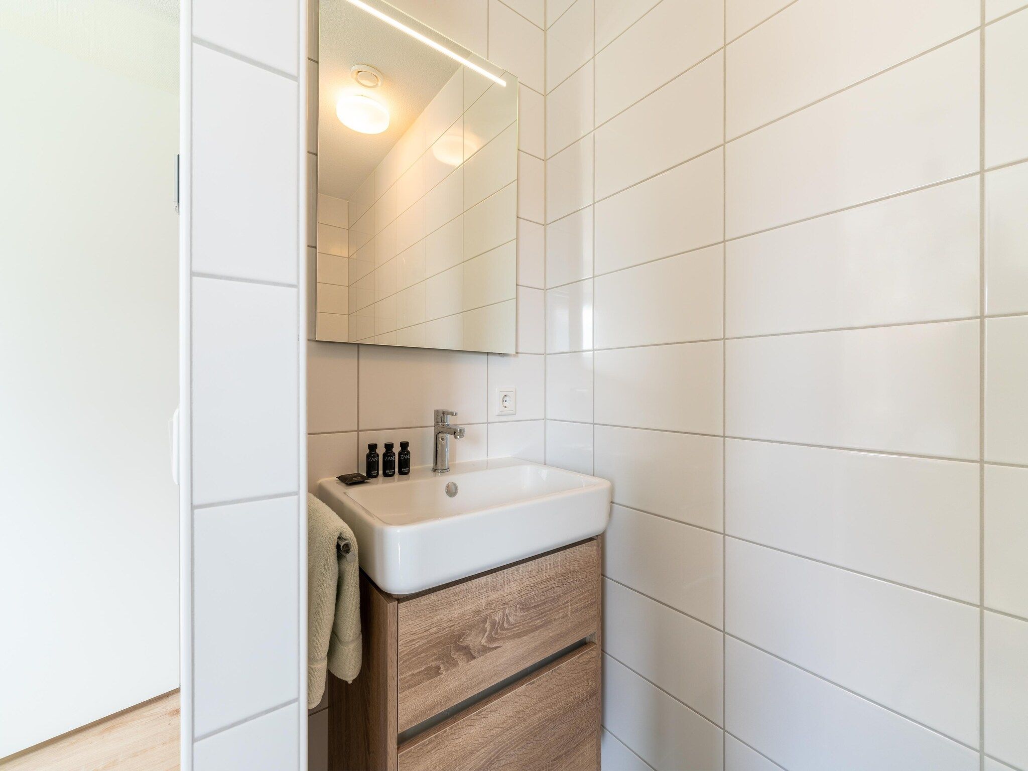 De badkamer van De Scholekster Huis Nr 29 in Scherpenisse