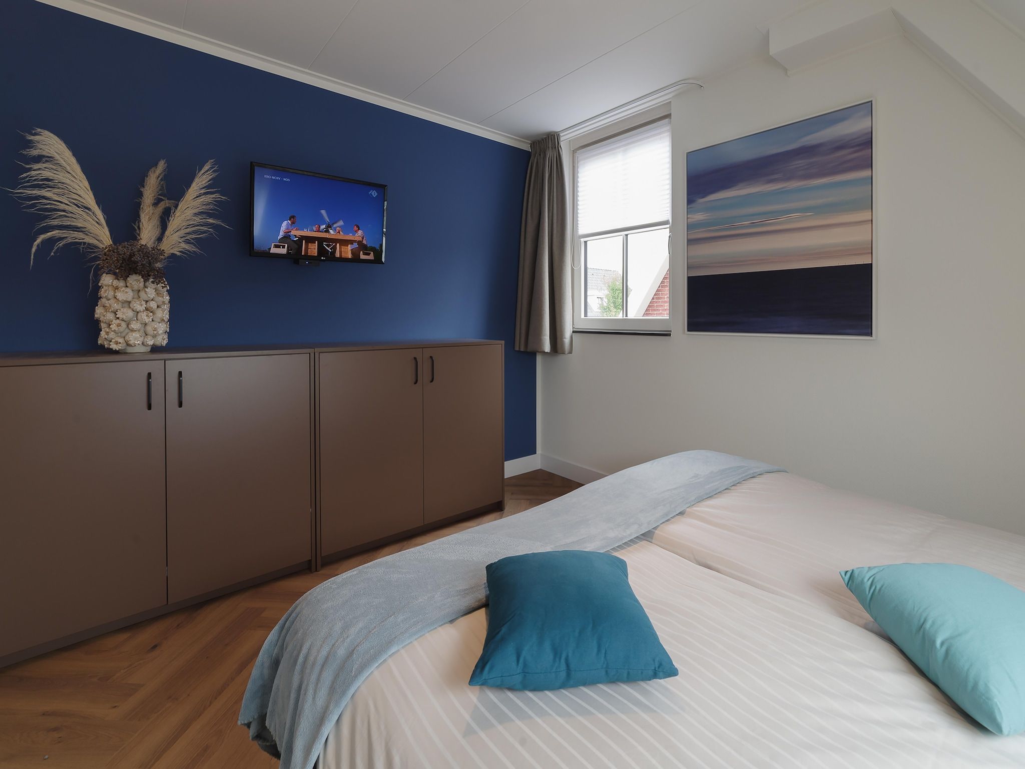 Een slaapkamer van Zeeuwse Pracht 8 p welness in Colijnsplaat