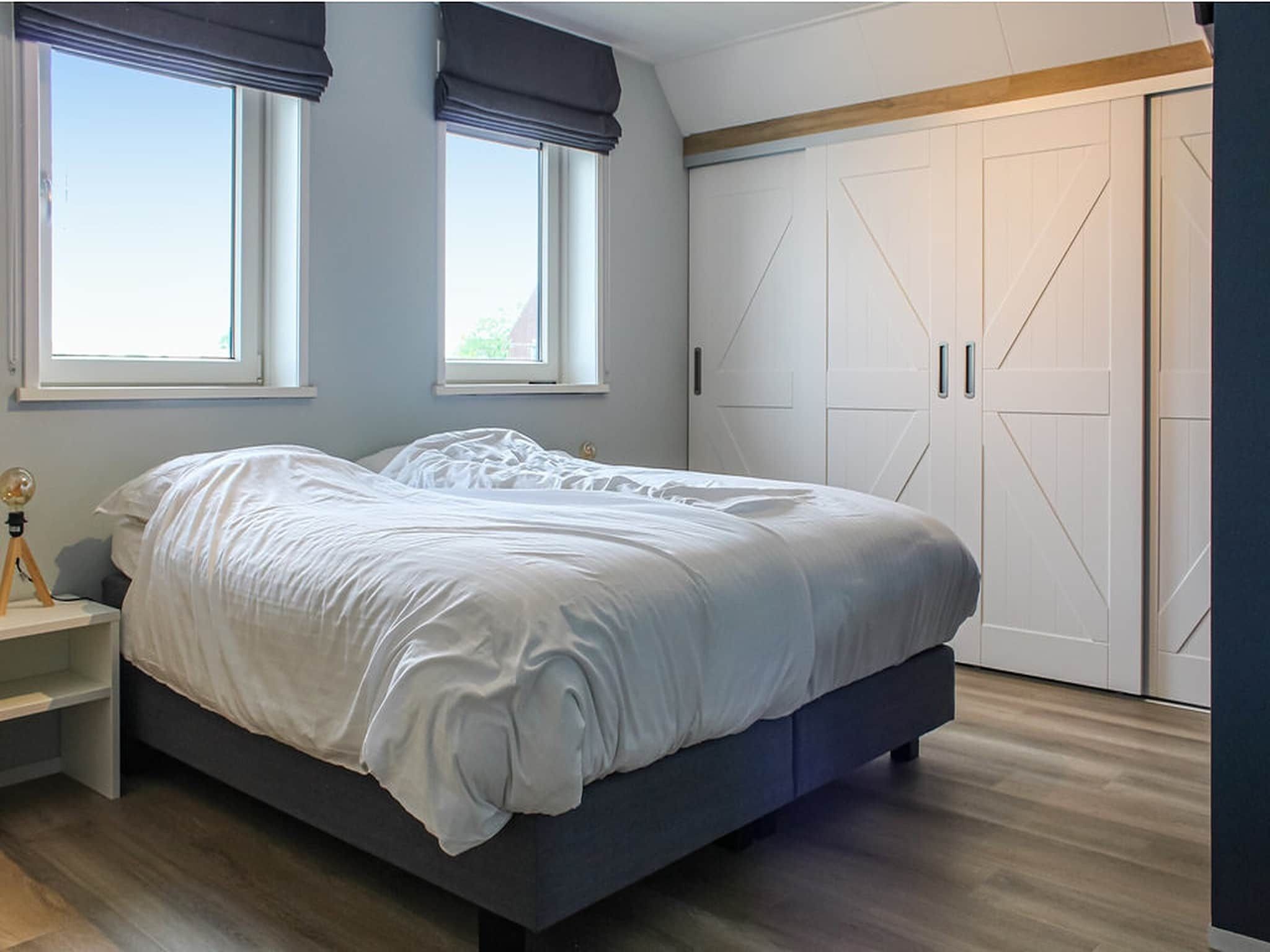 Een slaapkamer van Recreatiepark Idskenhuizen 1 in Idskenhuizen