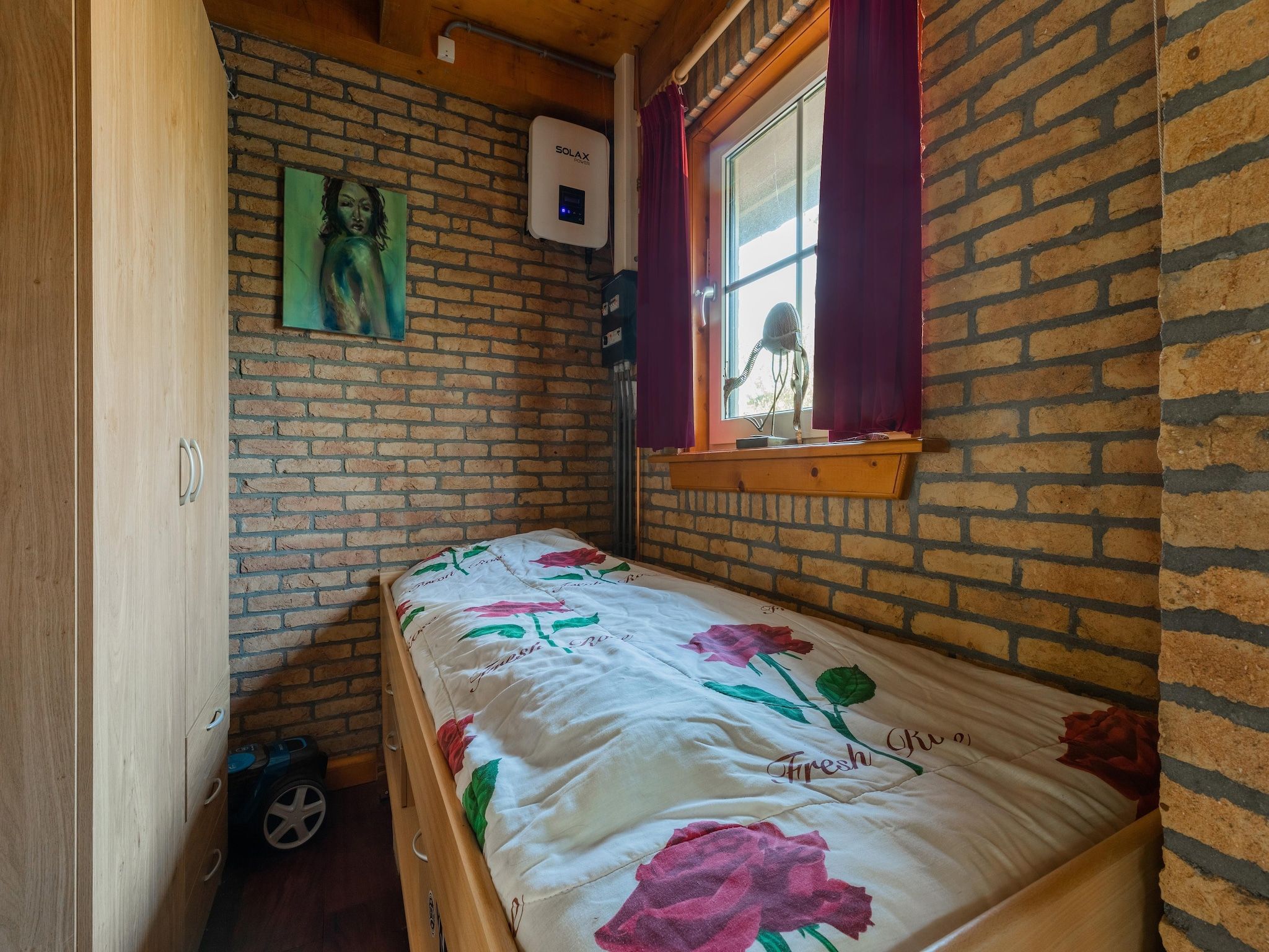 Een slaapkamer van Vakantiewoning Wijnaldum in Wijnaldum