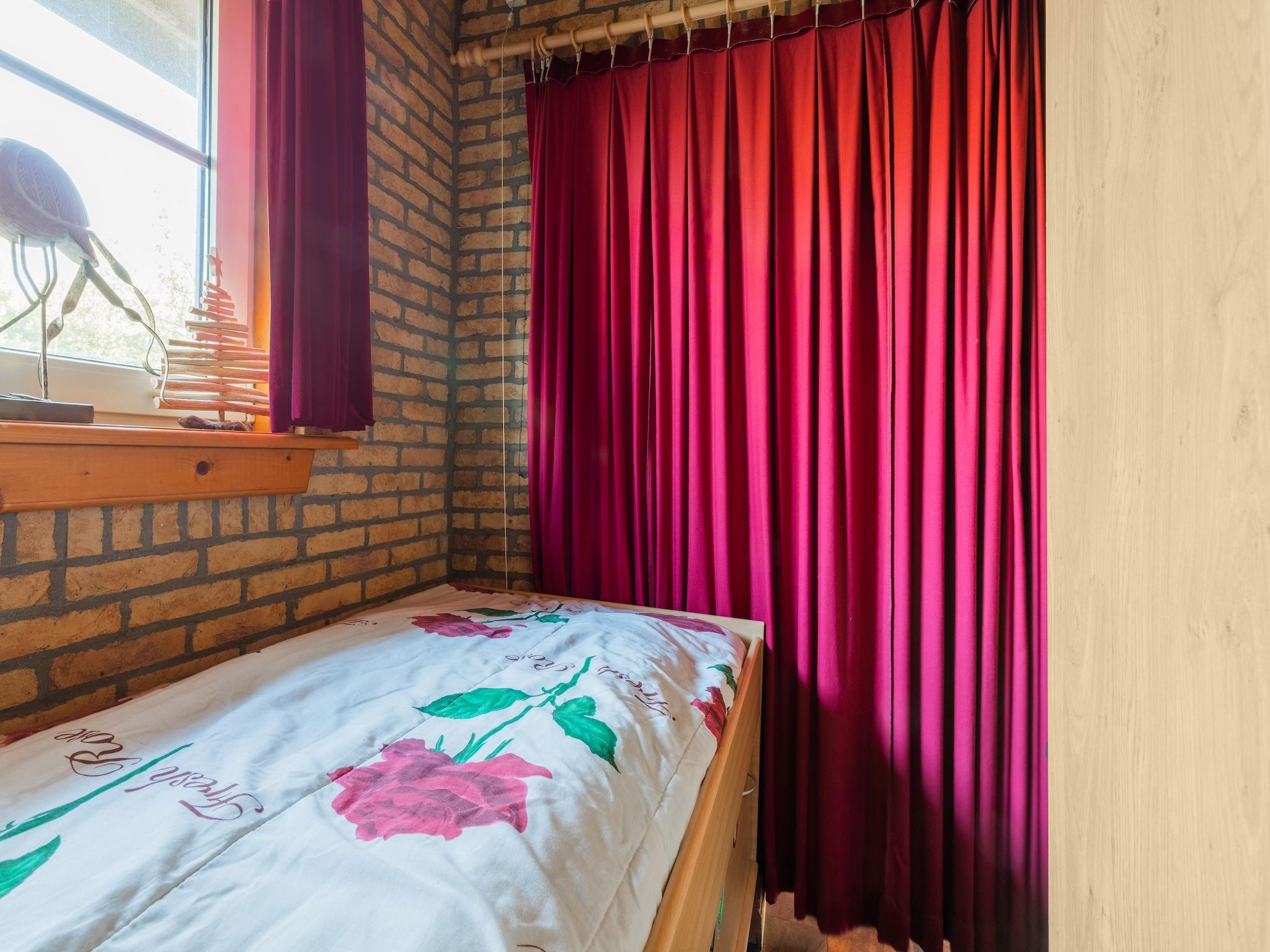 Een slaapkamer van Vakantiewoning Wijnaldum in Wijnaldum