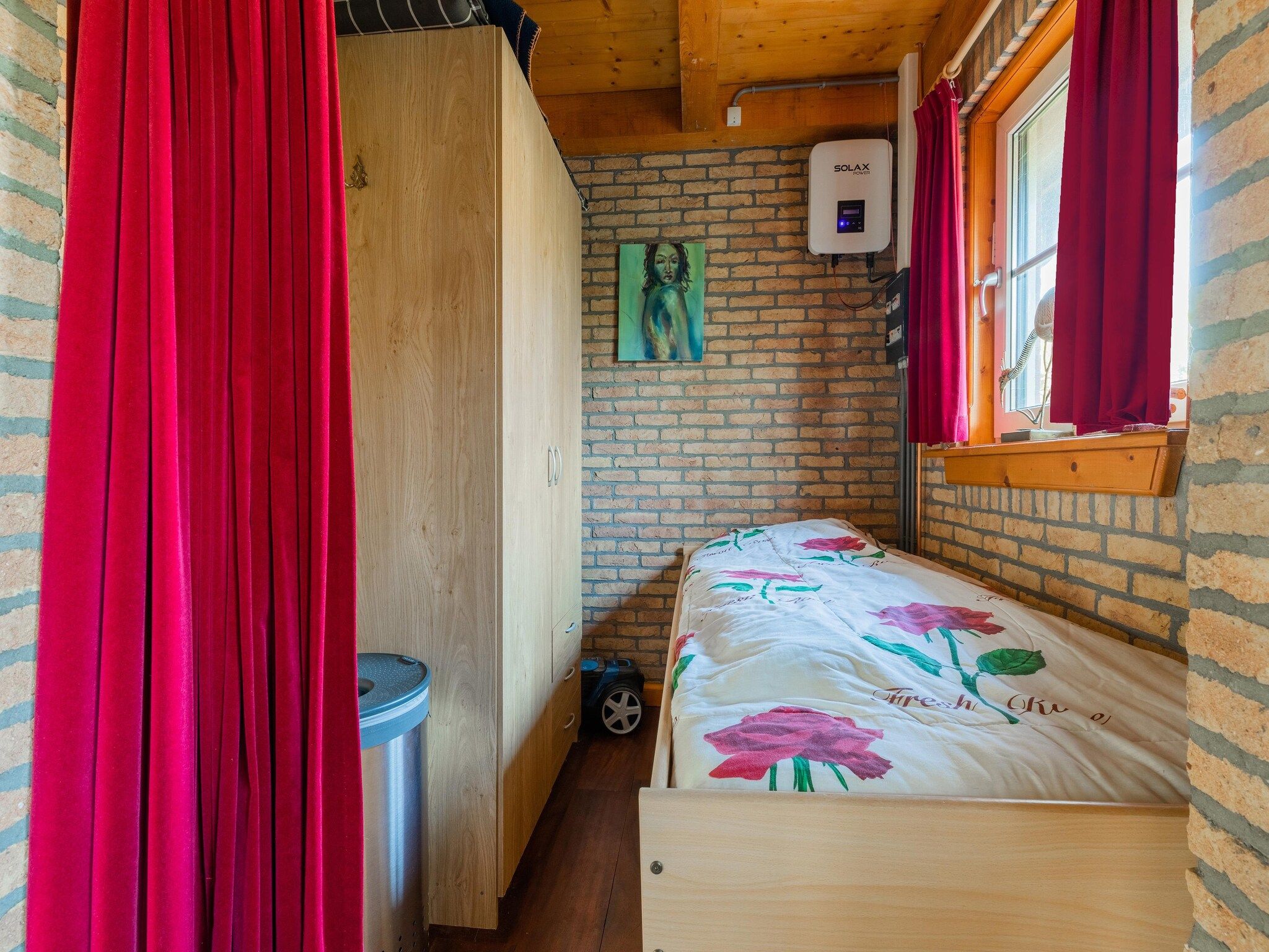 Een slaapkamer van Vakantiewoning Wijnaldum in Wijnaldum