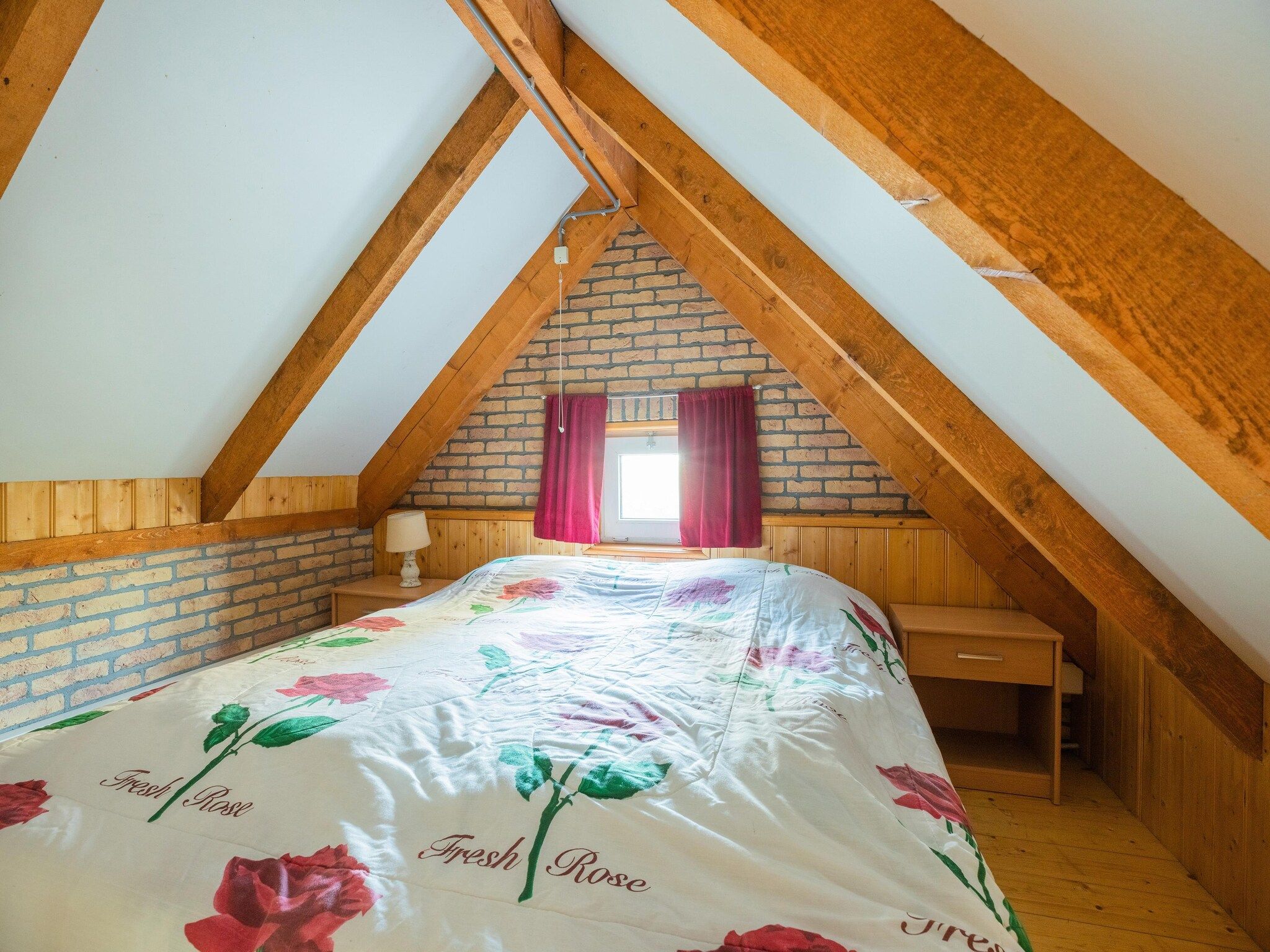 Een slaapkamer van Vakantiewoning Wijnaldum in Wijnaldum