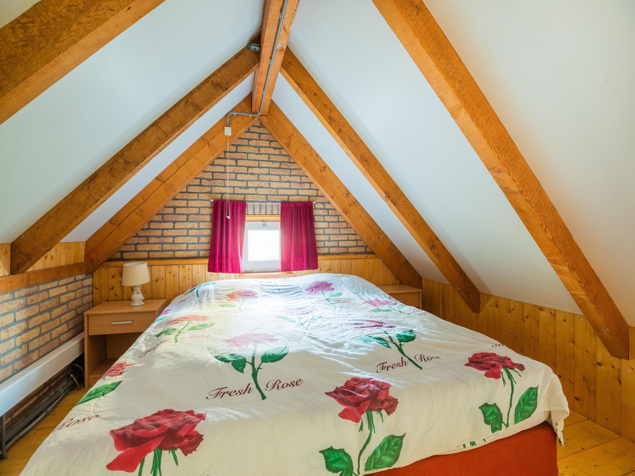 Een slaapkamer van Vakantiewoning Wijnaldum in Wijnaldum