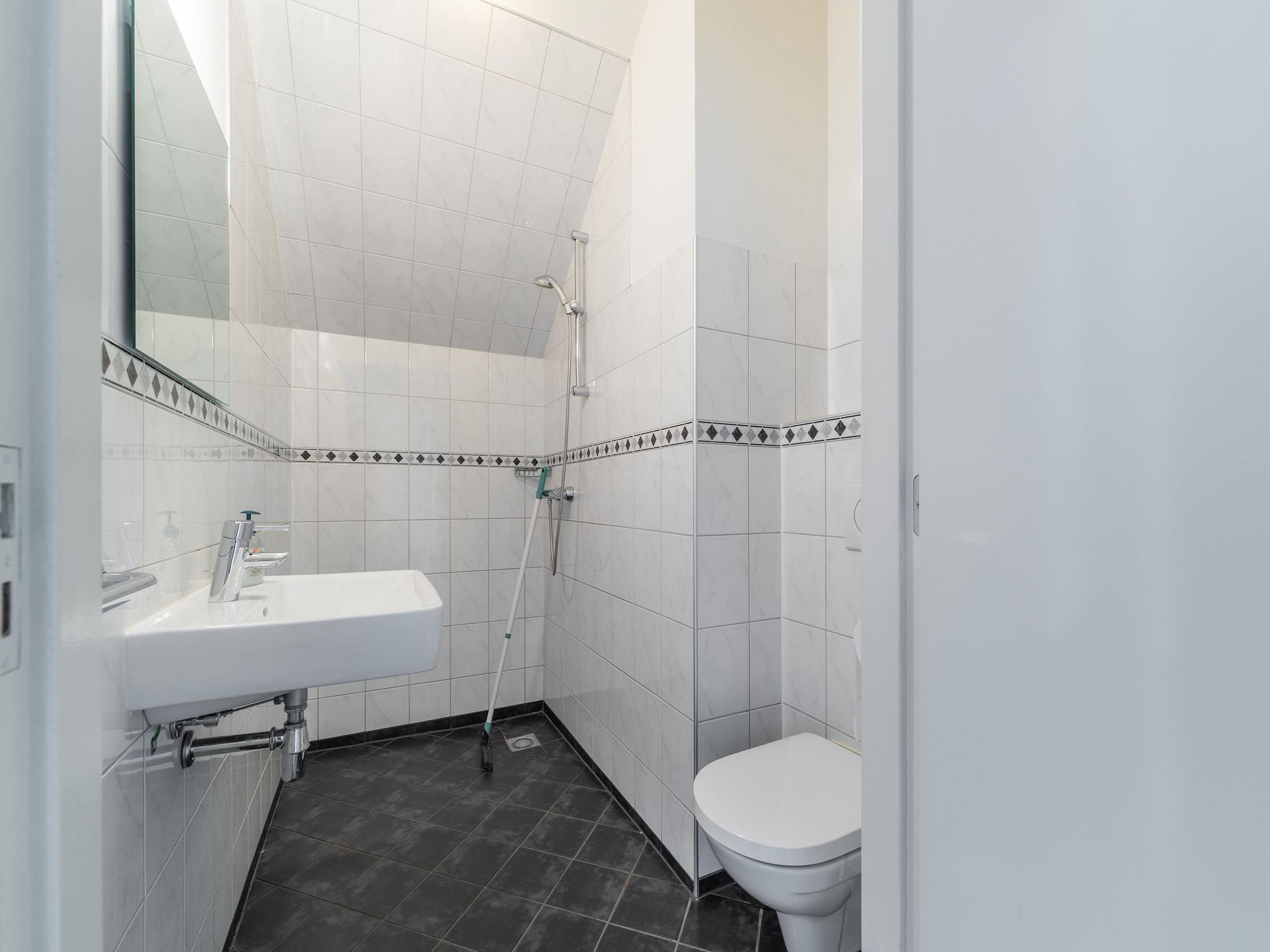 De badkamer van The Old Farmhouse in Montfoort