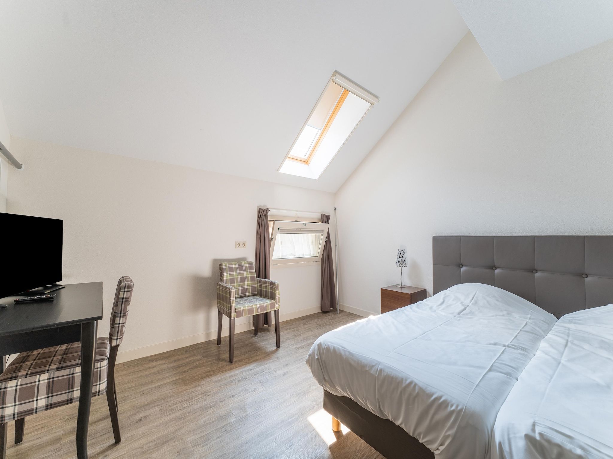 Een slaapkamer van The Old Farmhouse in Montfoort