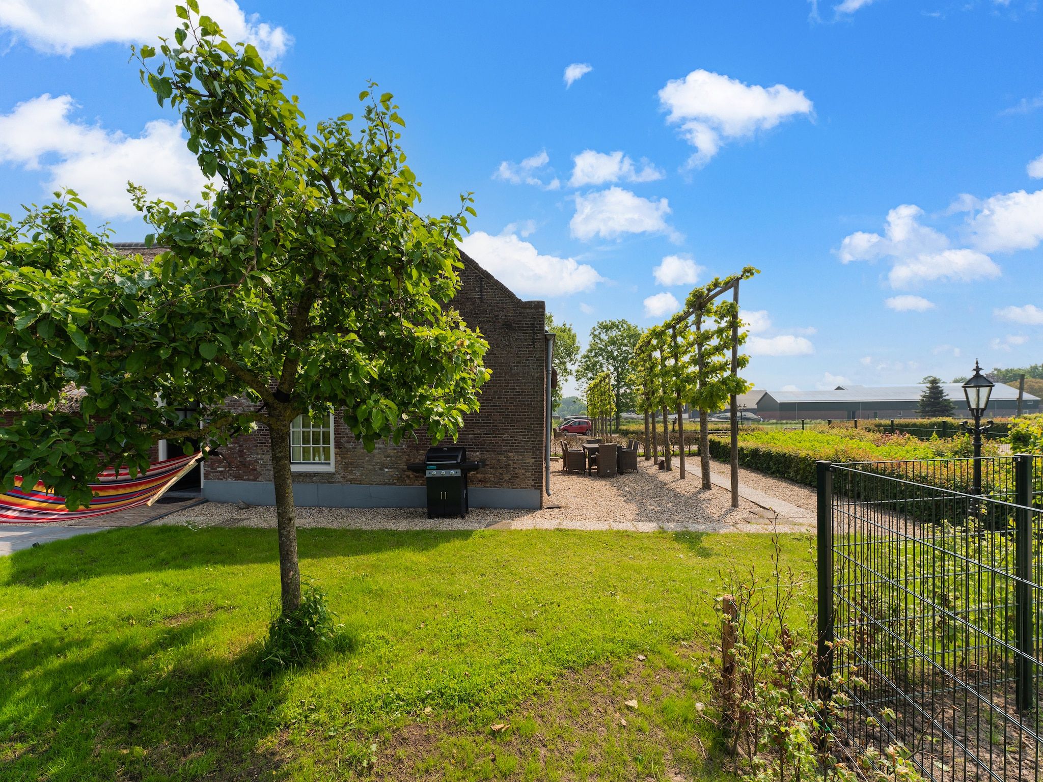 De tuin van The Old Farmhouse in Montfoort